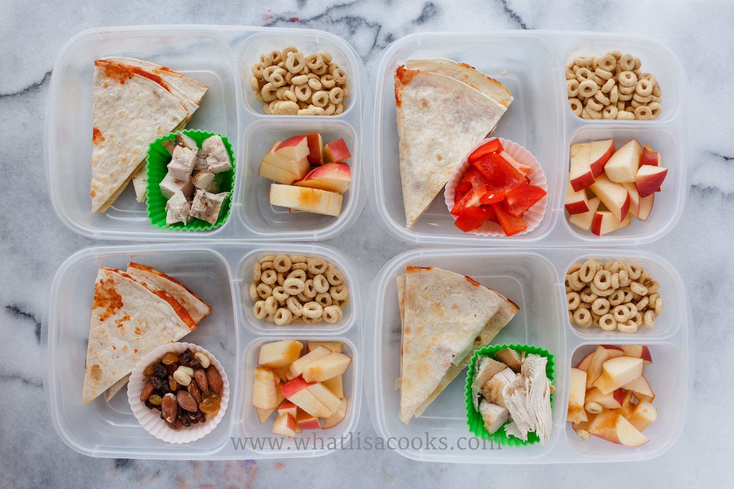 Pizzadillas - just a quesadilla with tomato sauce and mozzarella. Sides of either turkey, nuts, or peppers, and apples and cheerios. 