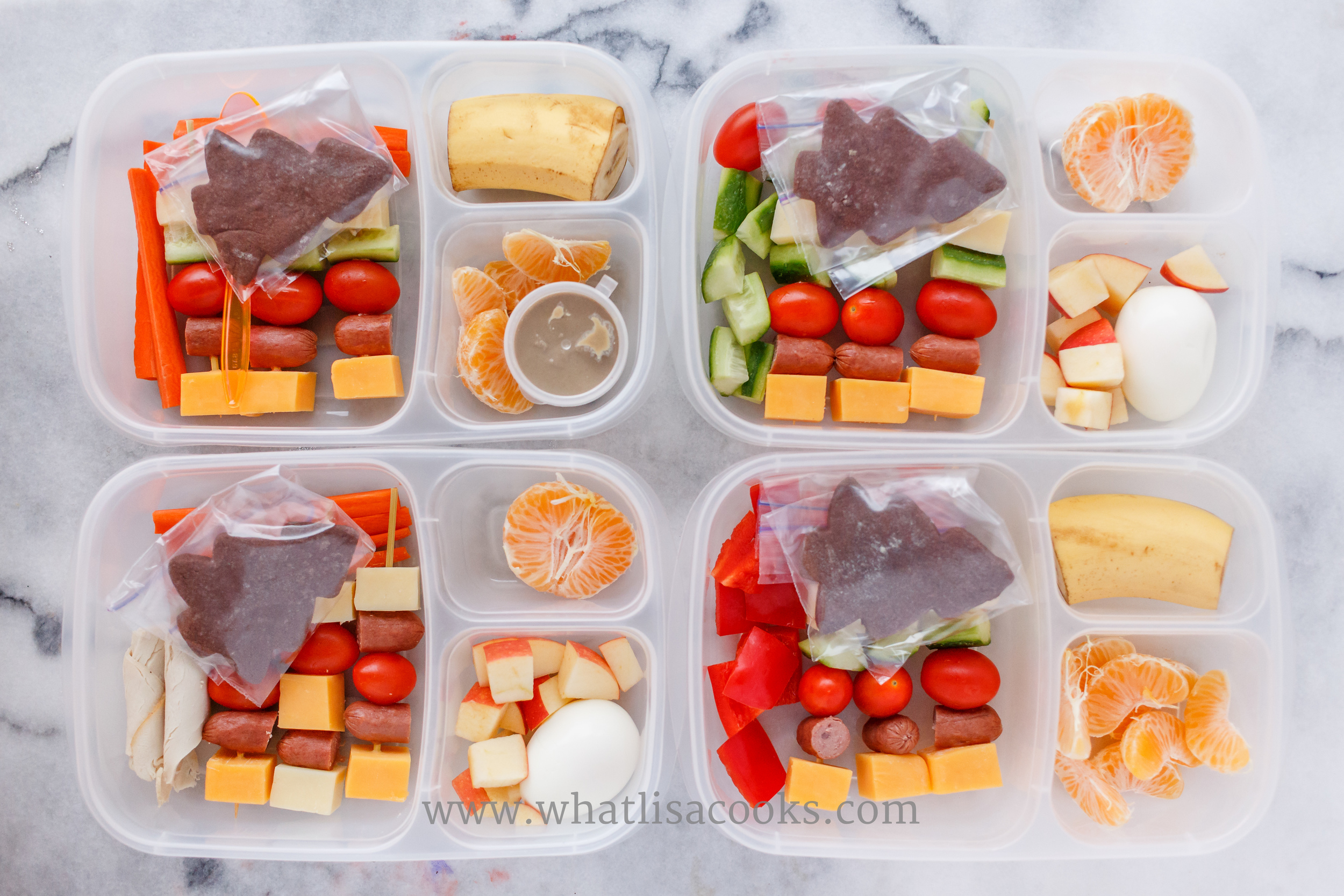The last lunch before Christmas break! Skewers of various combinations of cheese, veggies, hot dog, with more veggies and fruit on the side. Two have a boiled egg, one has sunbutter. 