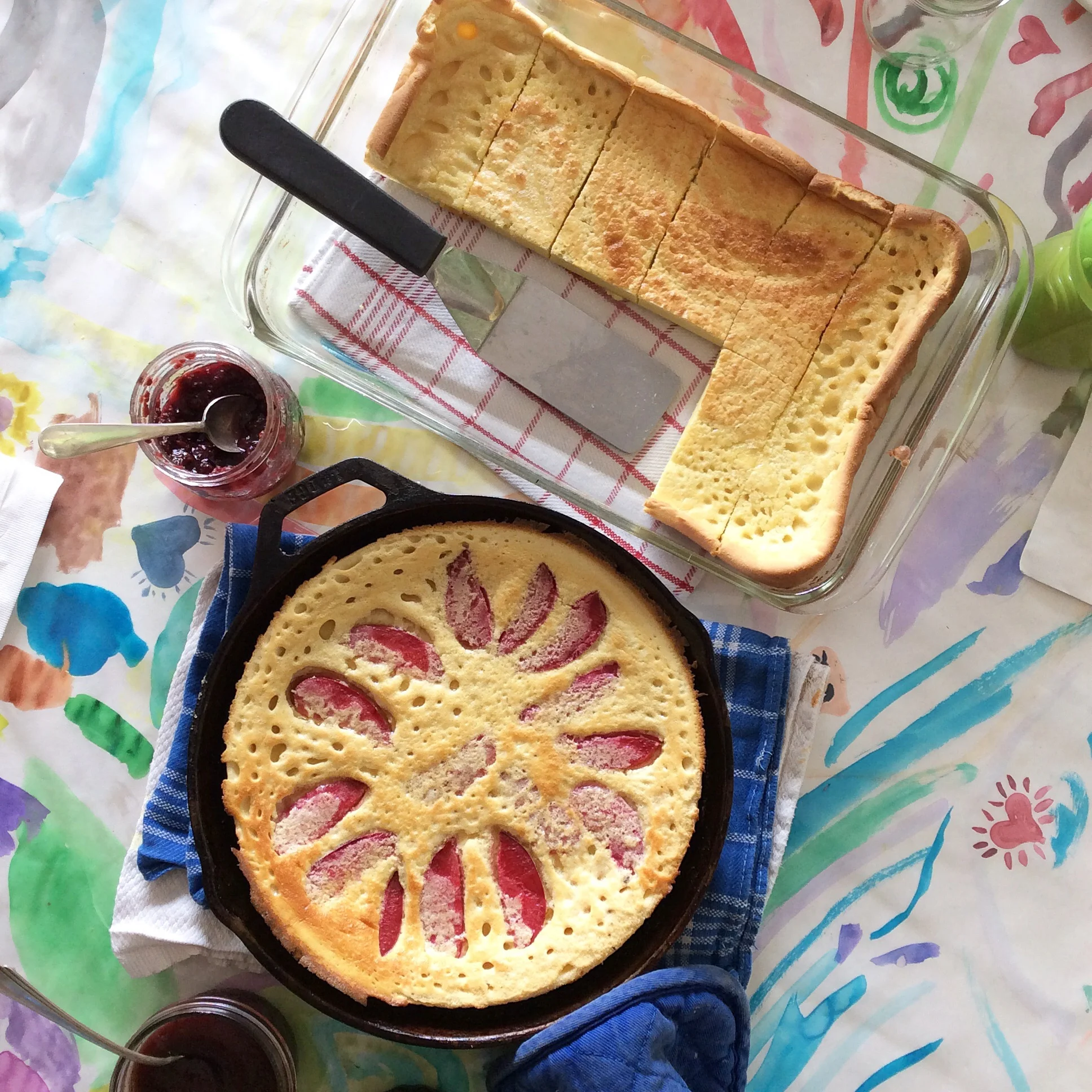 The pretty one in the cast iron pan has plums in it. I just sliced them and layered in a nice pattern right before putting it in the oven.