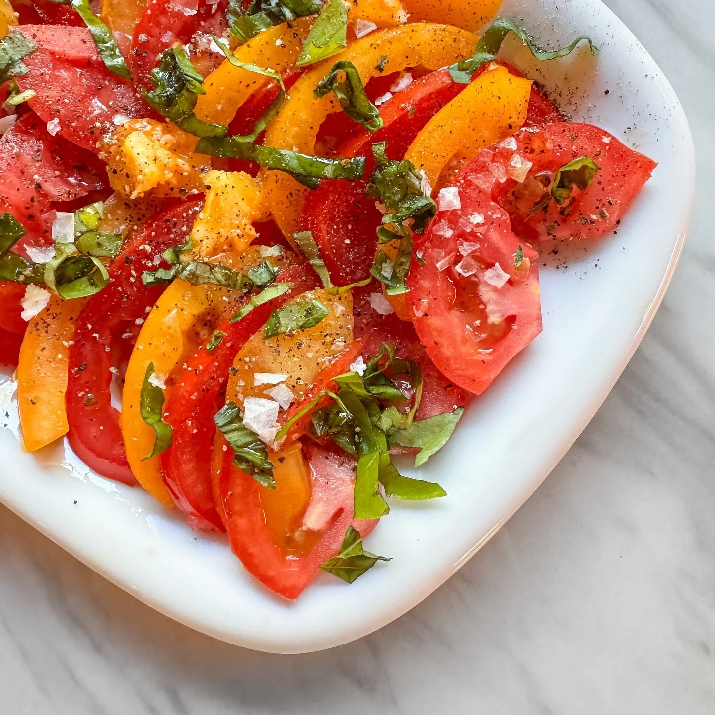 Another simple tomato salad with tomatoes and basil from the garden.