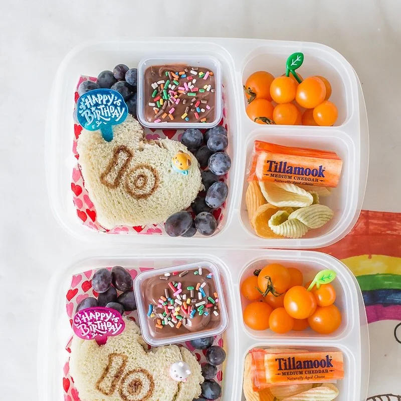 We had a birthday this week, so I thought I&rsquo;d share with you a fun throwback birthday lunch. Making lunch a little extra special for a big day doesn&rsquo;t have to be complicated. This lunch is PB&amp;J cut in a quick heart shape, and the numb