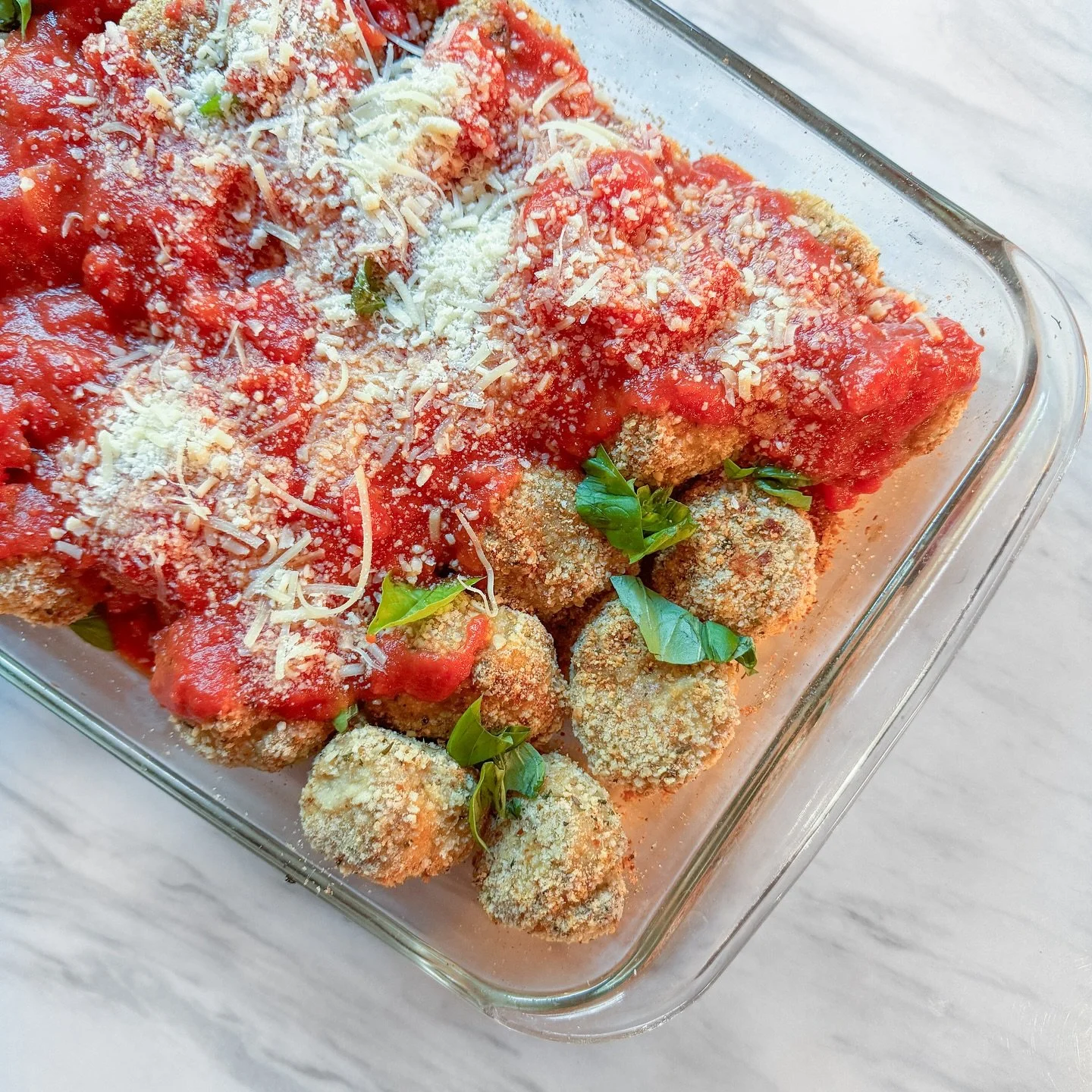 Dinner from a couple nights ago. I tried something new - chicken meatball Parmesan. I made the meatballs with 2/3 ground chicken and 1/3 ground pork, eggs, seasoned bread crumbs, garlic salt, and Parmesan cheese, and I rolled them in more bread crumb