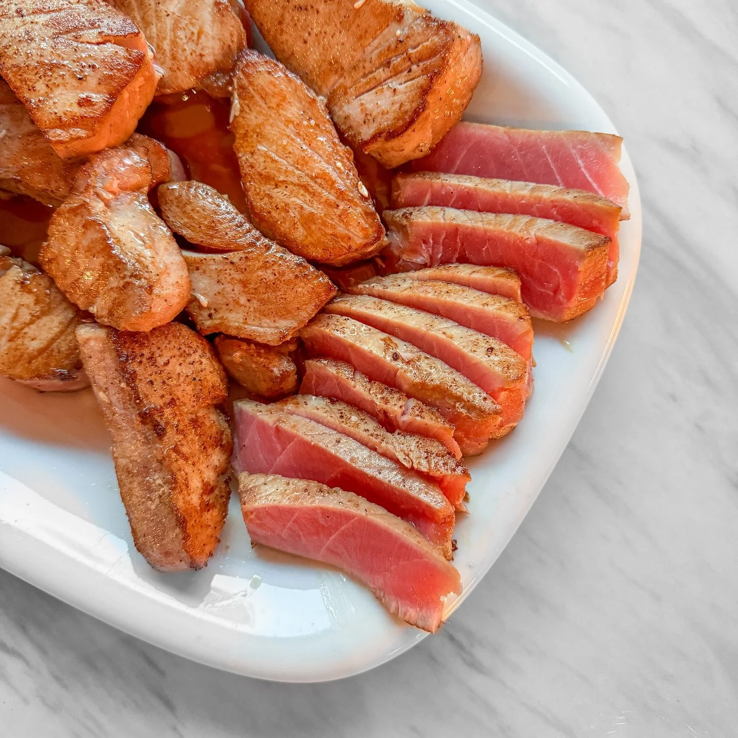 Seared ahi tuna for dinner. Marinated for about an hour with soy sauce, sesame oil, and white pepper, and then quickly seared in a very hot pan for just 30 seconds each side. So yummy.