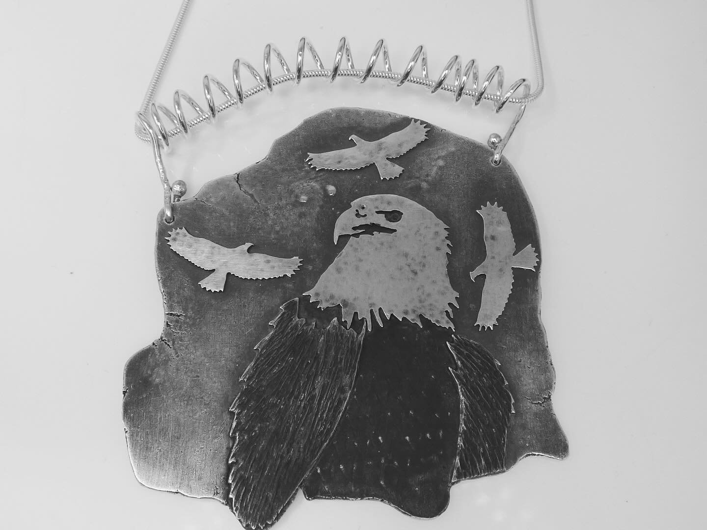 ✨ Wearable Art ✨

Reversible Bald Eagle/Hummer
This isn&rsquo;t just jewelry; it&rsquo;s a statement. Crafted with passion and inspired by the birds around me, each piece is a unique expression of artistry and style.
Step into a world where art meets