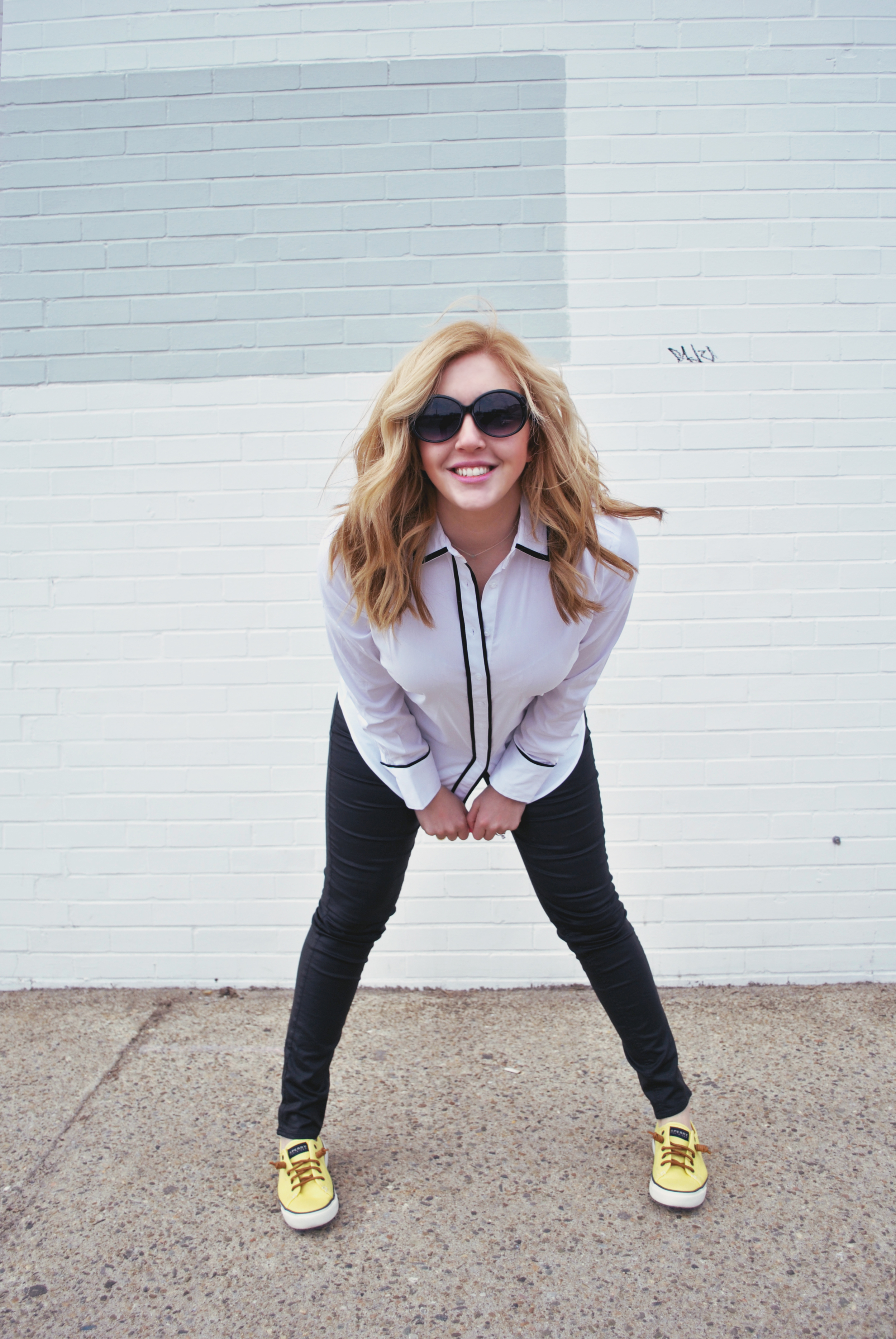 jumping for joy | thoughtfulwish // leather pants // ann taylor // white shirt // leather jacket // yellow sperrys