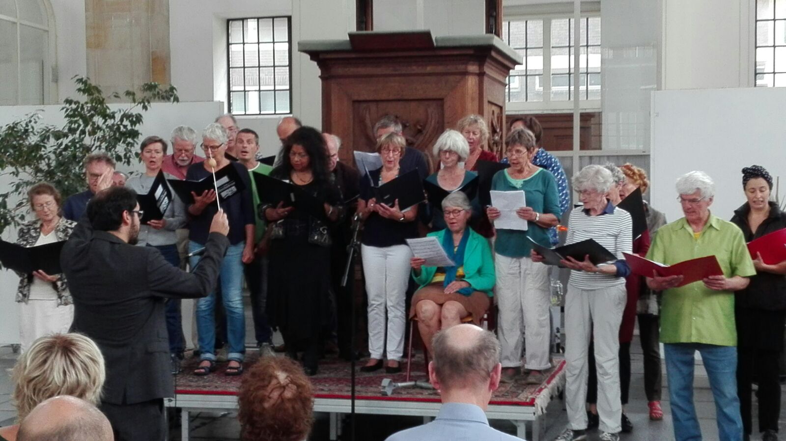 Groot Aardappelkoor tijdens de openingsbijeenkomst 29 juni in de Oosterkerk