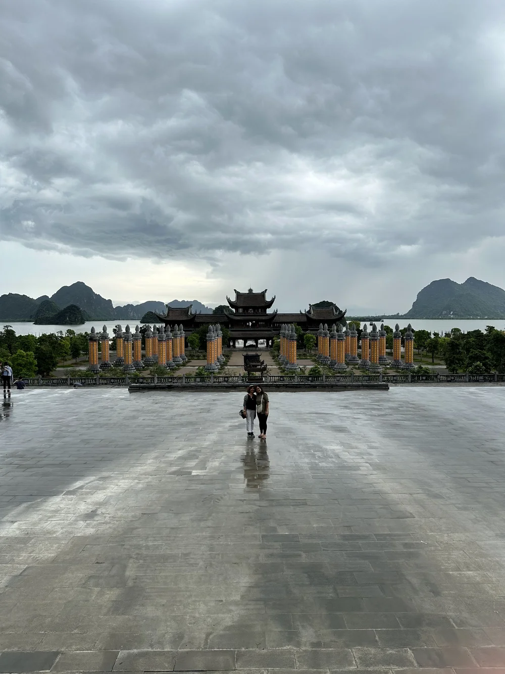  View of the Auntie Mom, Nancy, and giant urn from a temple’s steps.  