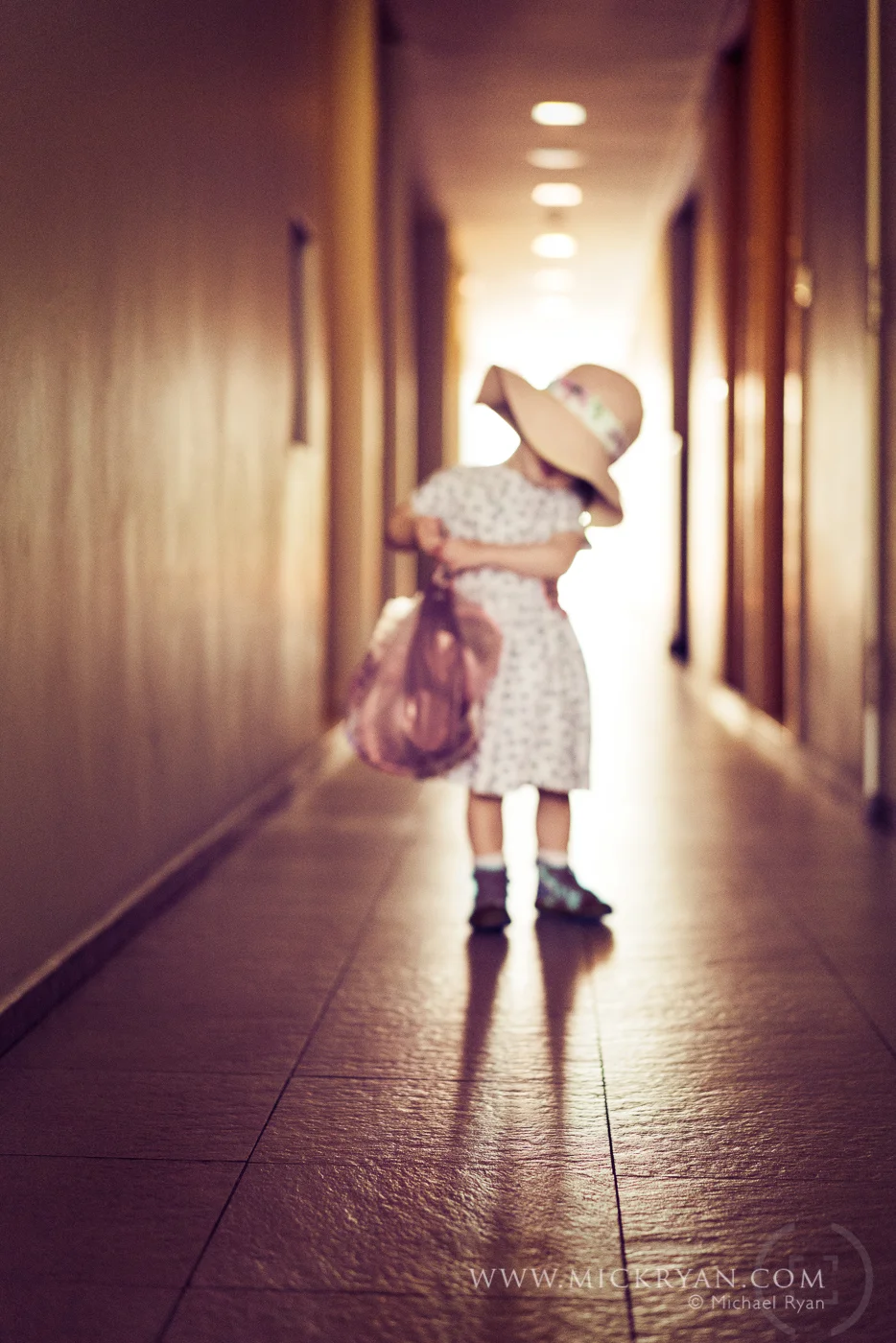 You can never guess what's going to entertain a baby. She loved playing in the corridor outside our door with the bag of buckets and spades for the beach.