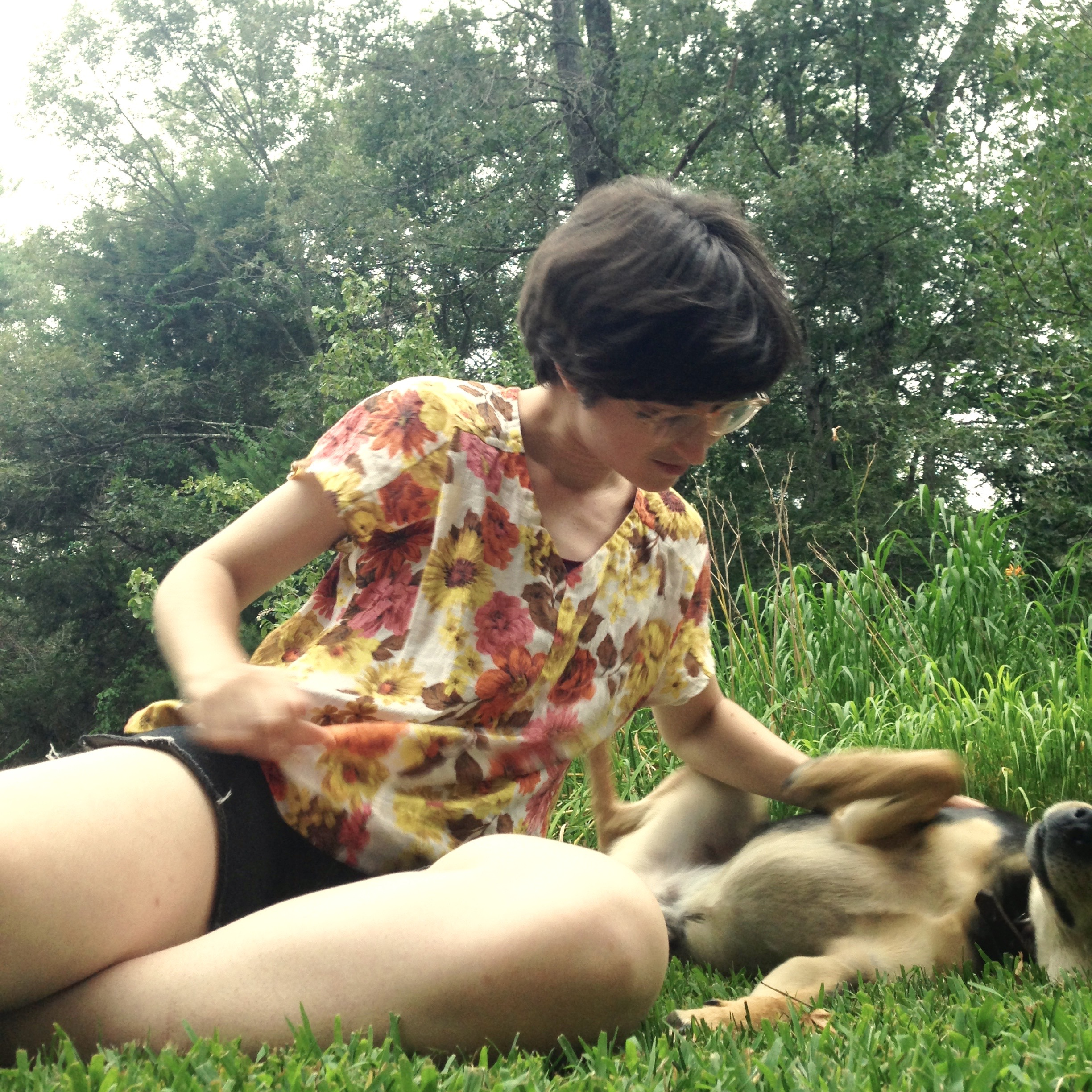 Here's me snuggling Pin outside in the grass in my muslin.