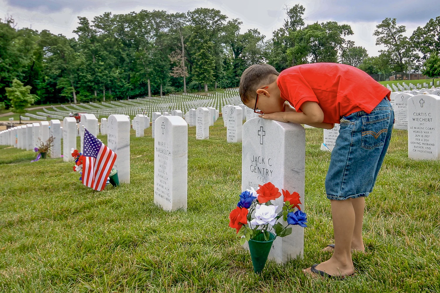 My grandson James at the grave site of his great grandfather. Photo circa 2013