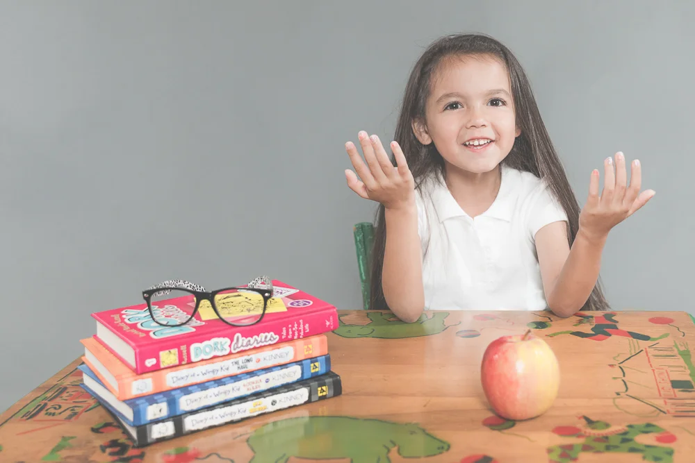 What!! You haven't had pictures taken to celebrate the first day of school! Make plans.