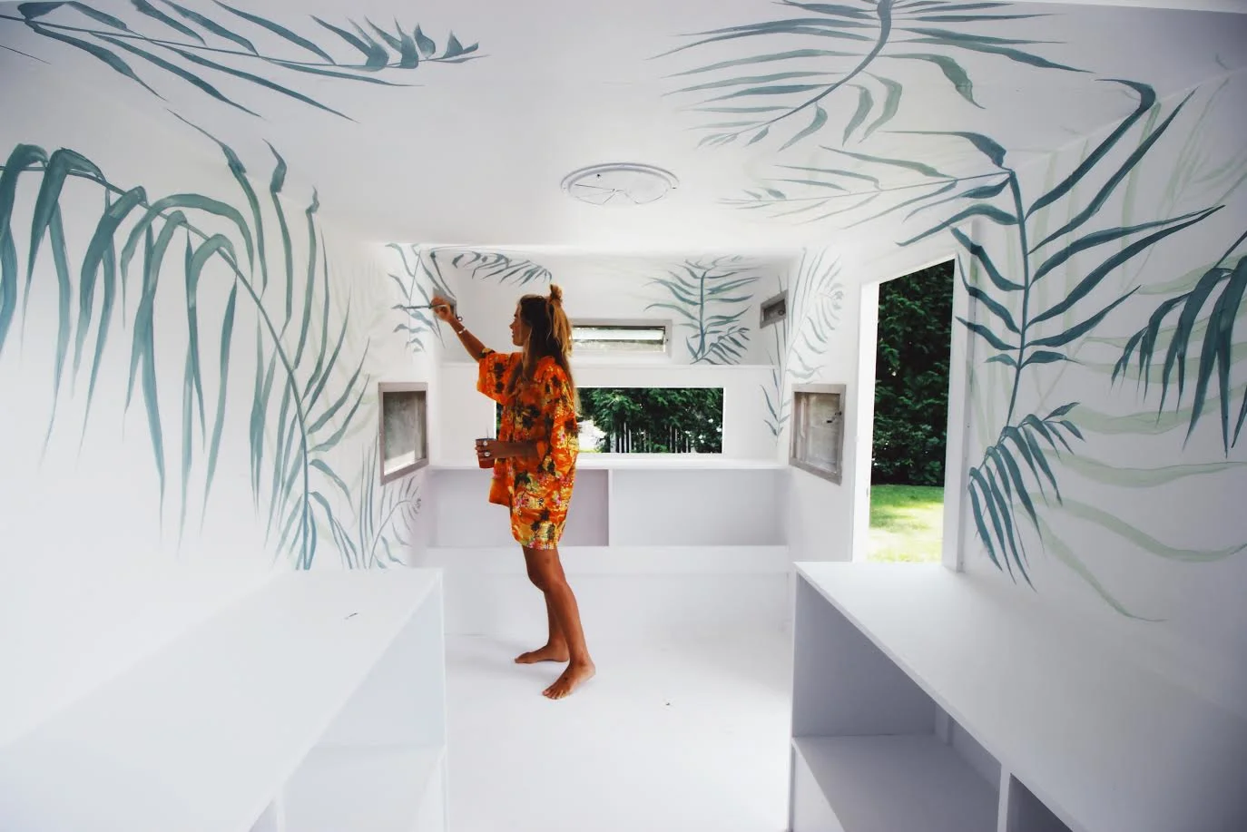 Decorative palms inside a trailer shell