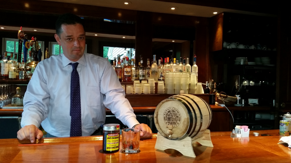 J.C. Mejia with Aspetuck Valley Country Club’s house-aged bourbon cask and cocktail