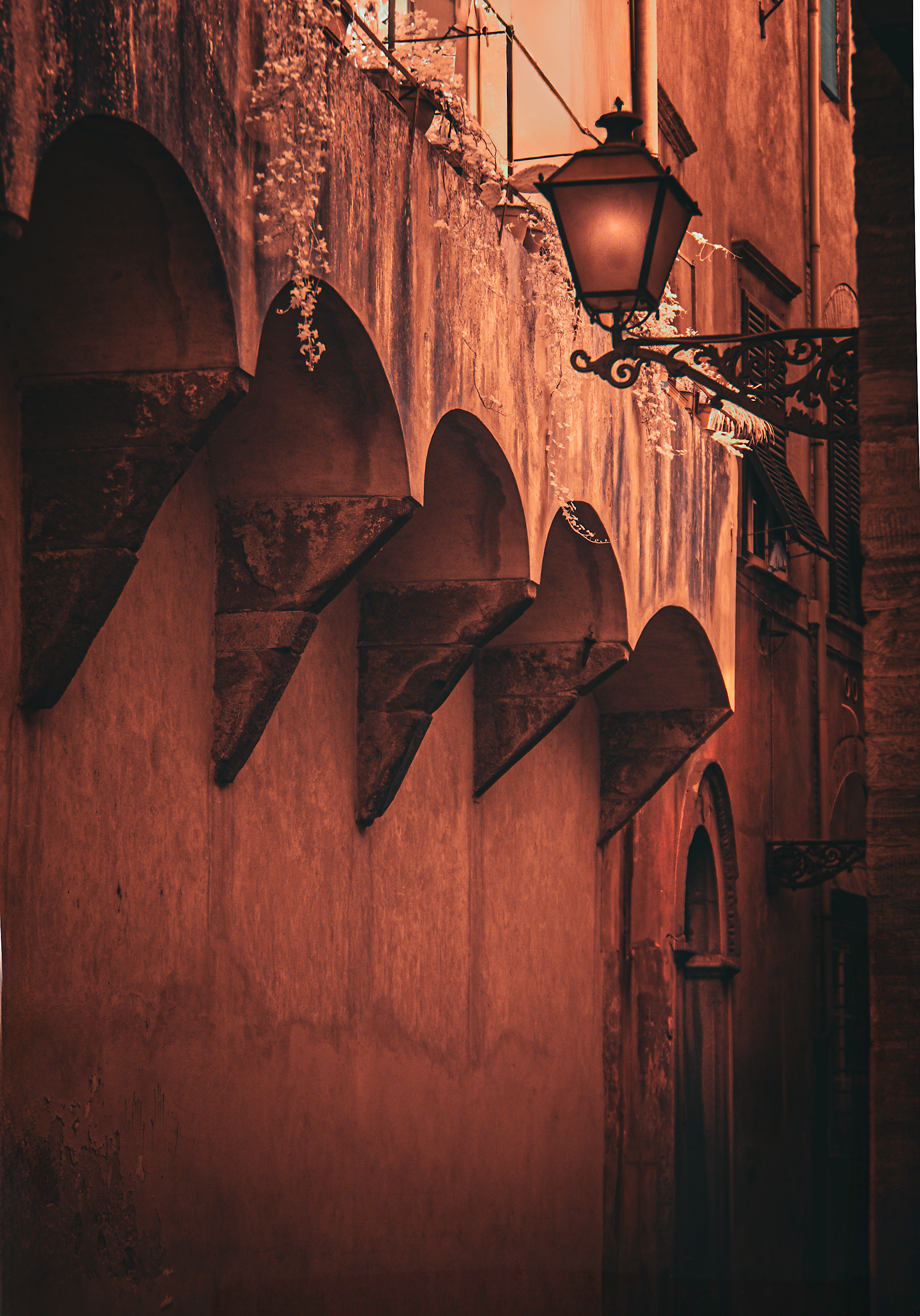 lamp post and medieval wall.png