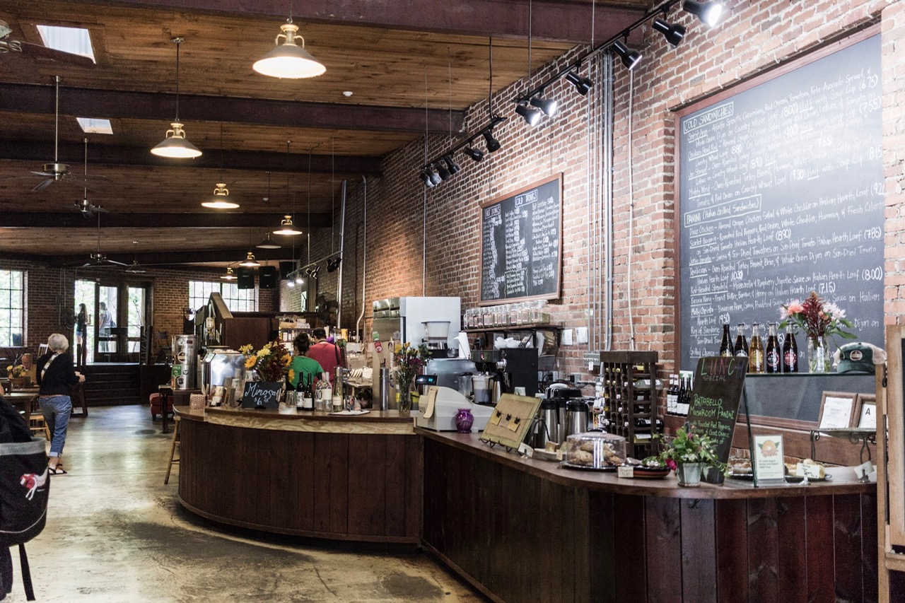 Panacea is the best coffee shop in town. Located in Frog Level they sell and brew their own brand of coffee and also offer a delicious menu which includes paninis and salads and wraps. Not pictured: outside picnic style seating along the river. 