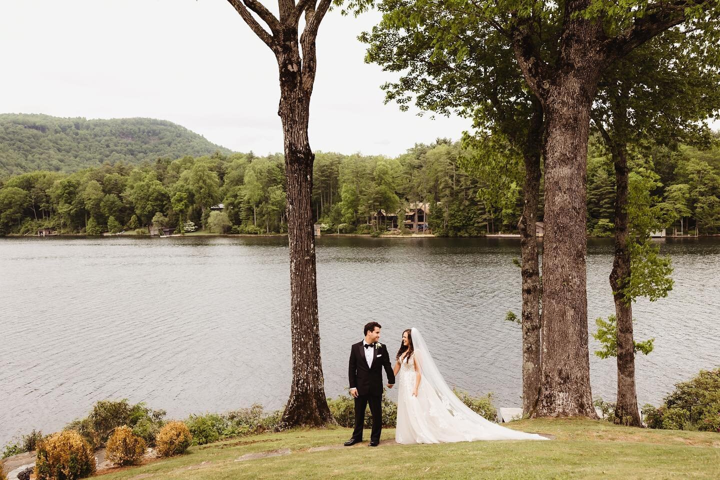 Perfectly timed pauses in the rain made for a lovely celebration at @thegreystoneinn for Taylor and Todd!

Venue @thegreystoneinn 
Planning @pinnaclewnc 
Floral design @petalandfernwnc 
Video @takeonefilmsjax 
Band @newroyalsband 
Ceremony music @all
