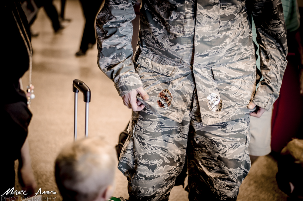 They gave him their police badge stickers given tothem by the airport security guard.