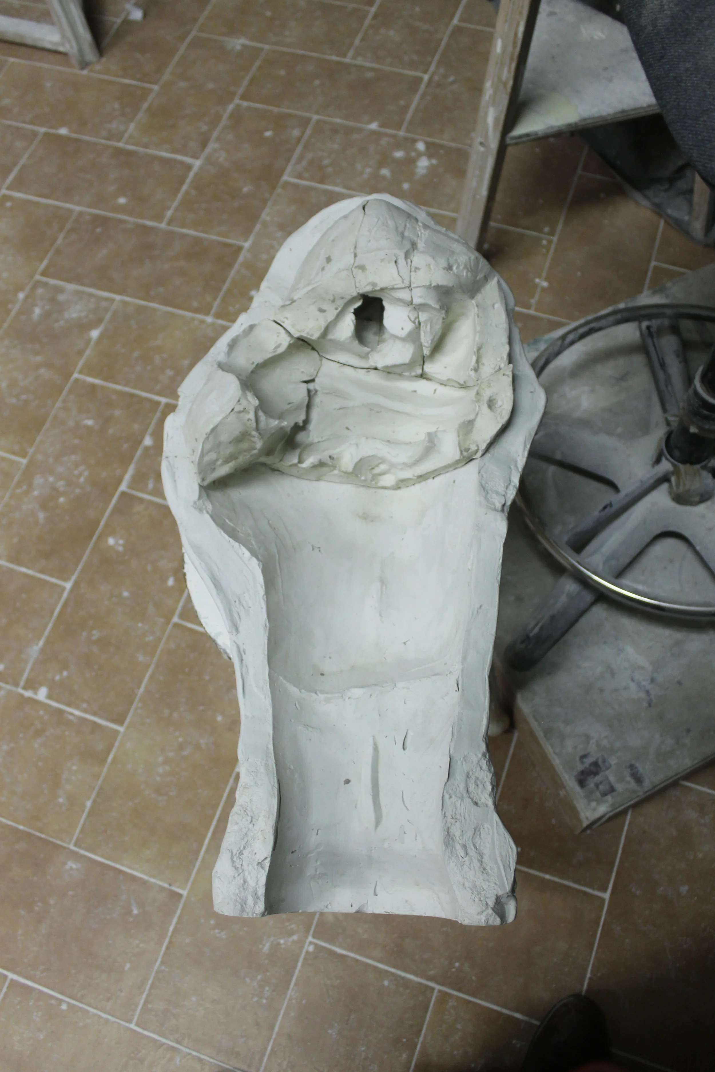 paetially assembled press mold in its jacket.