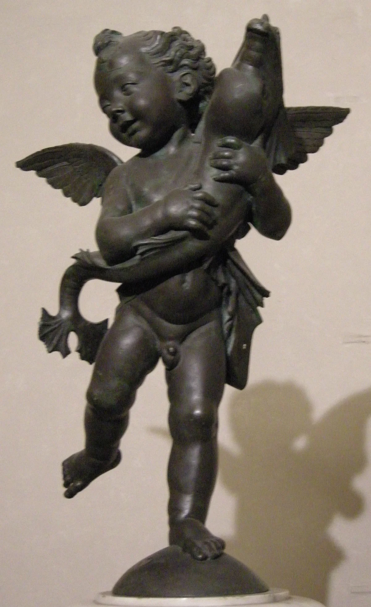 Putto holding a Dolphin - Verrocchio