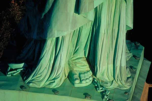 Liberty Enlightening the World - detail of chains of liberty trampled underfoot.