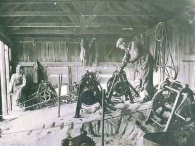 A Winch Man at work, on top of Mount Rushmore.