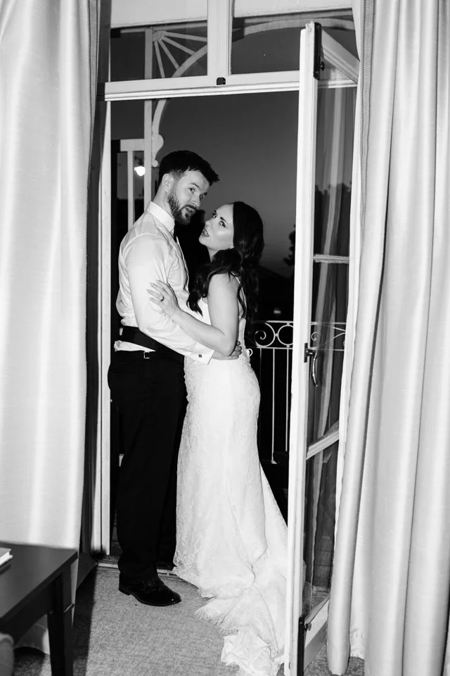  Bride and groom in hotel room editorial style at Richmond Hill Hotel luxury wedding photographer 
