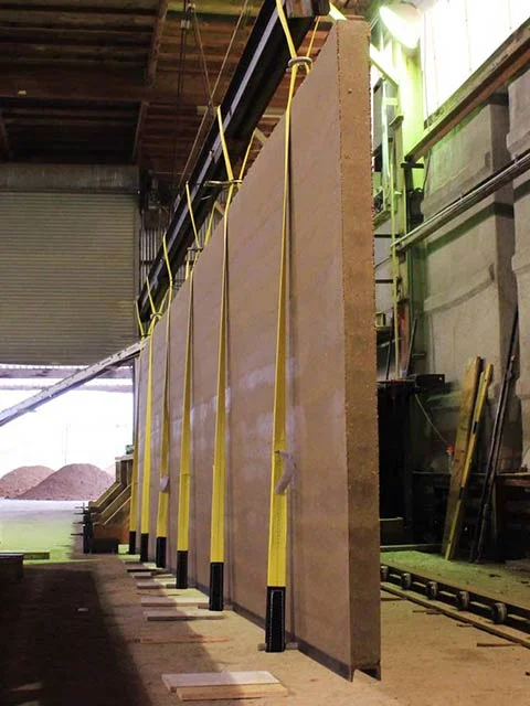 Rammed Earth Works specializes in factory made pre-cast rammed earth for situations where traditional 18-24 inch thick walls aren't feasible.