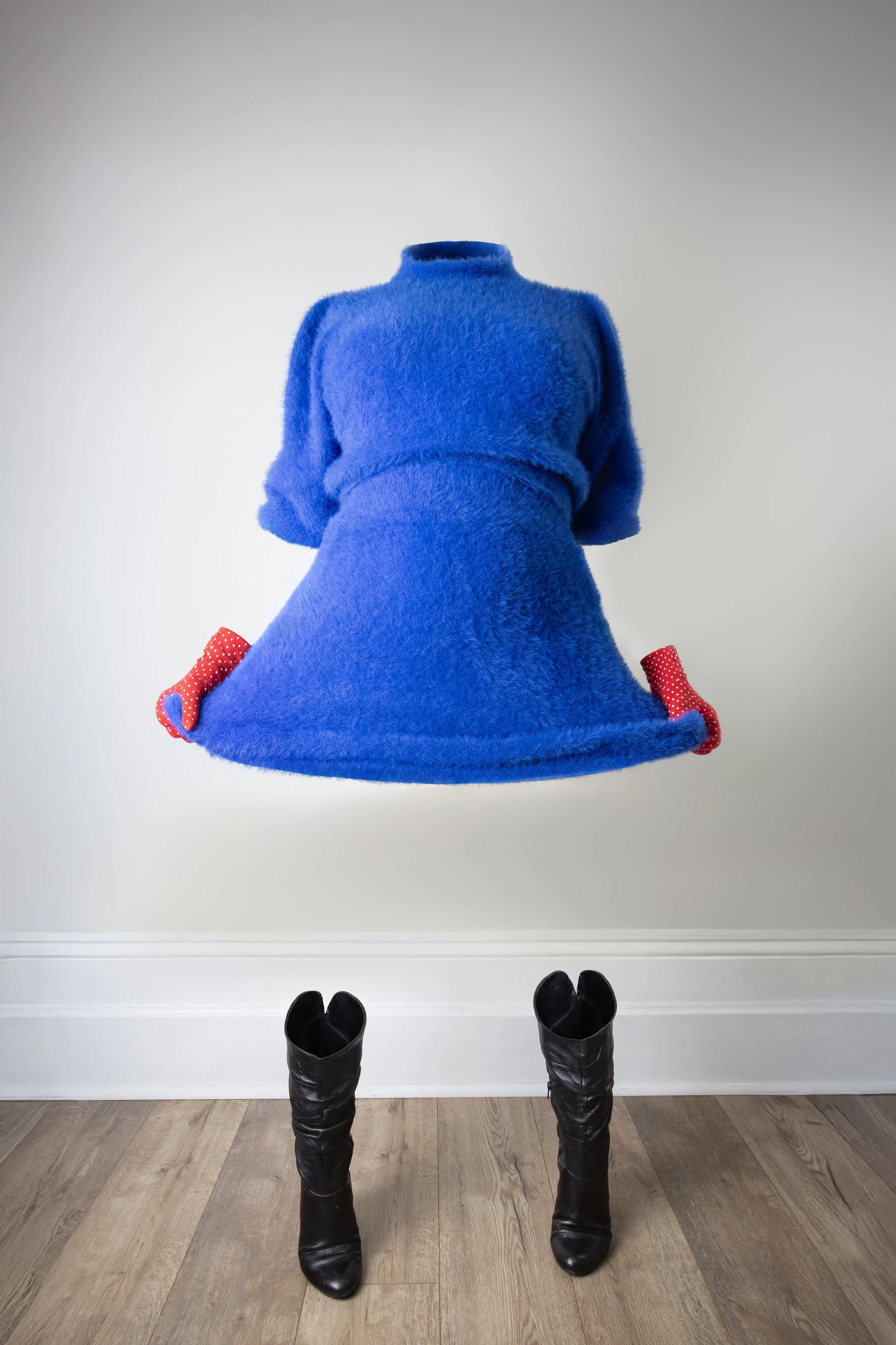 The Invisible Woman lifts her skirt.jpg