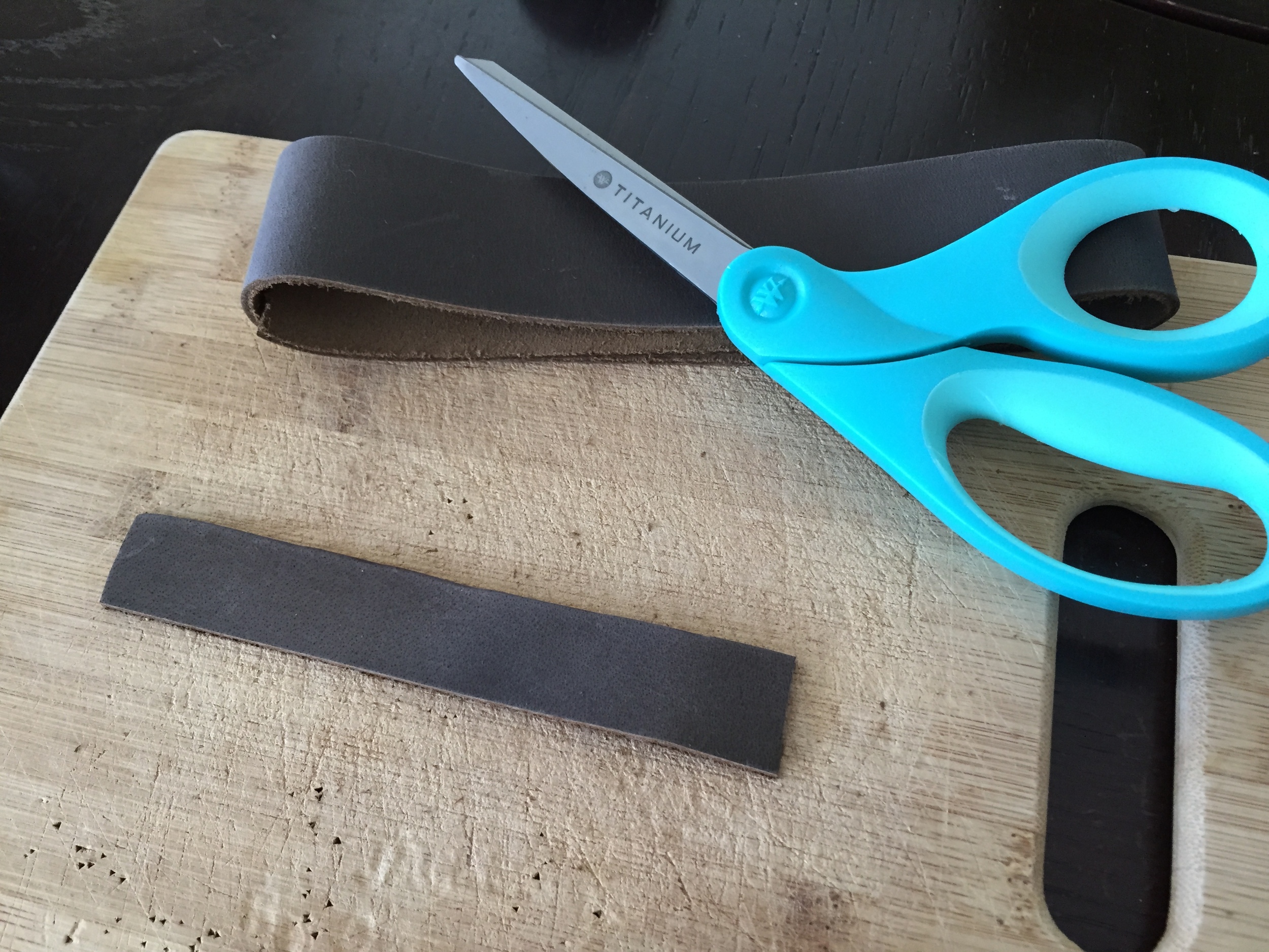 Cut a strip that gives you plenty of room for stamping and folding around the keychain ring. I cut them to about 5.5" lengths. I could get 2 keychains out of one strip if I cut it in half lengthwise. 