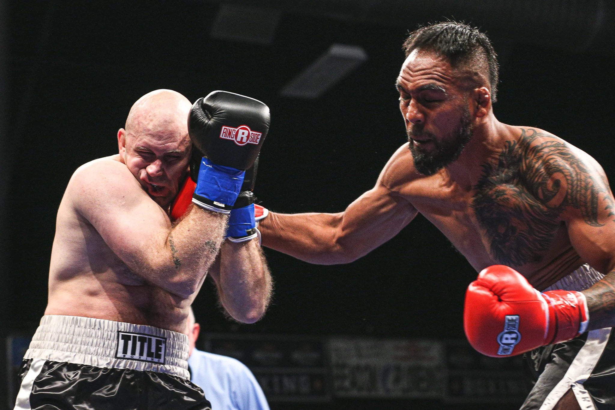 Sua Tuani (debut) delivers a right cross to Nick Coughran (0-1) in his professional debut at Brian Halquist Productions, Battle at the Boat 123. Saturday September 7, 2019 from the Emerald Queen Casino in Tacoma, WA. (Matt Burn/NW Fightscene)