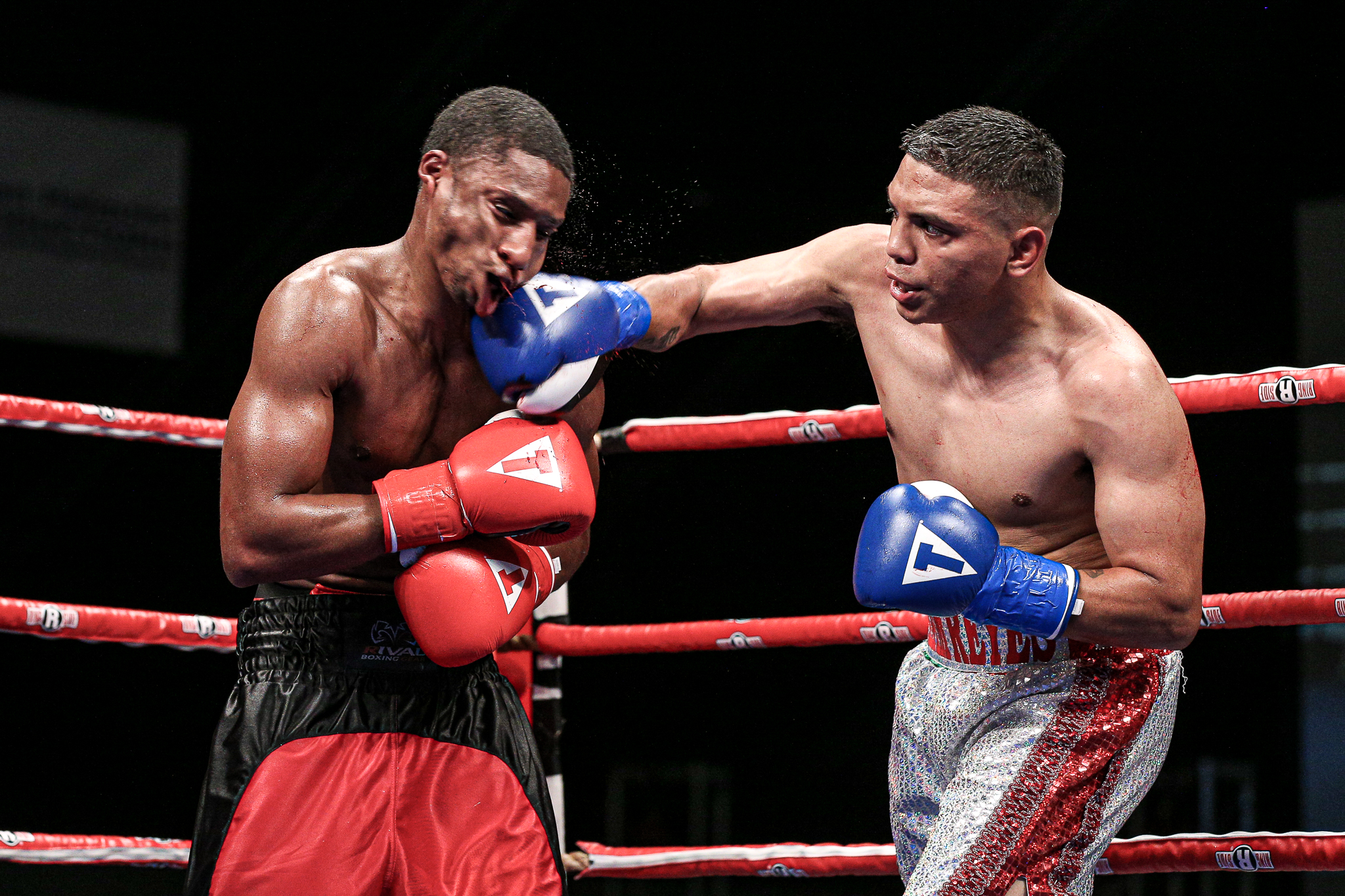  Cris Reyes (7-0) delivers a right cross against Manuel Monteiro (7-0) in the main event of Brian Halquist Productions, Battle at the Boat 123. Saturday September 7, 2019 from the Emerald Queen Casino in Tacoma, WA. (Matt Burn/NW Fightscene) 