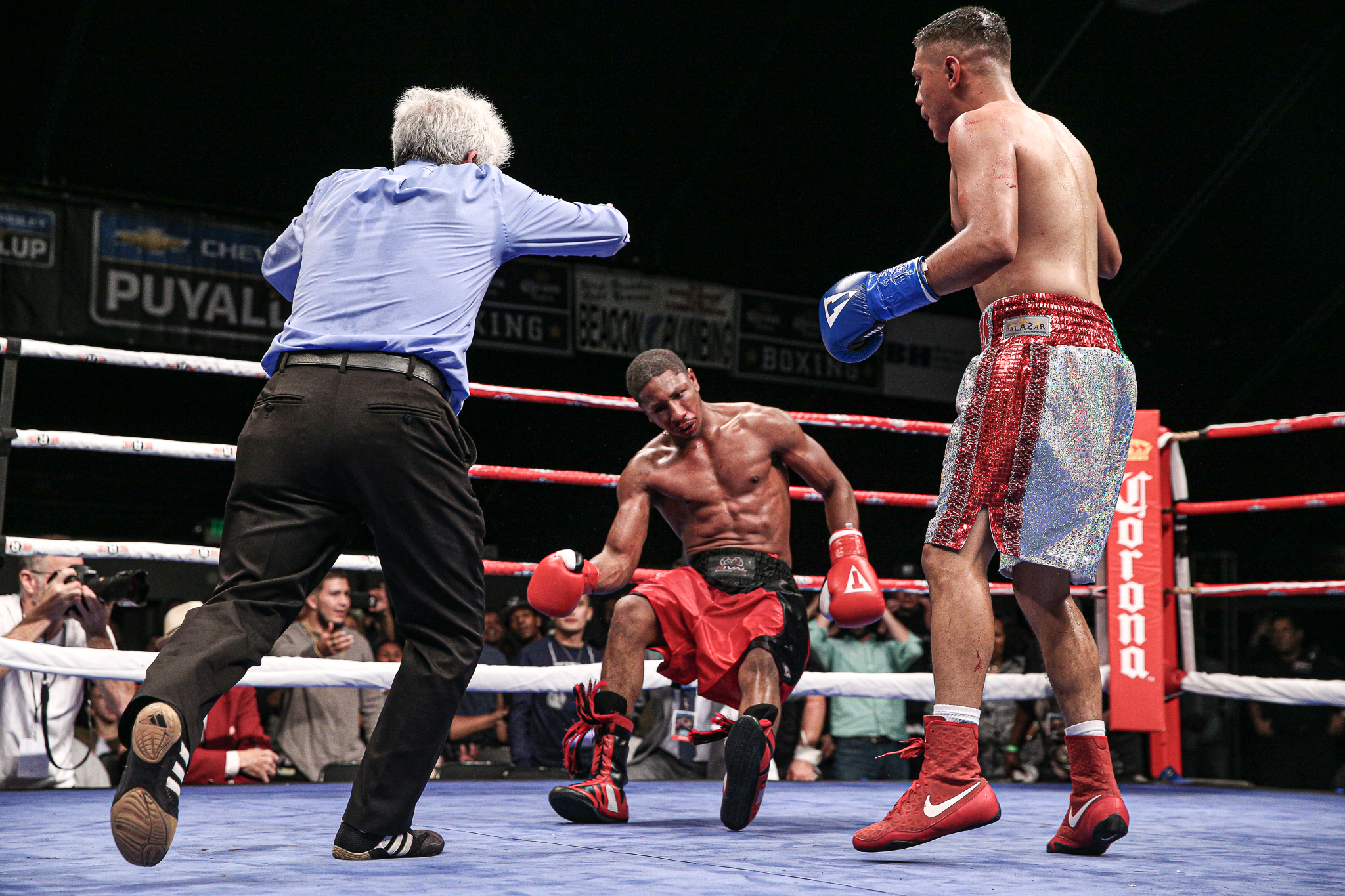  The referee moves into calls an end to the fight after a Cris Reyes (7-0) right hook in the main event of Brian Halquist Productions, Battle at the Boat 123. Saturday September 7, 2019 from the Emerald Queen Casino in Tacoma, WA. (Matt Burn/NW Fight