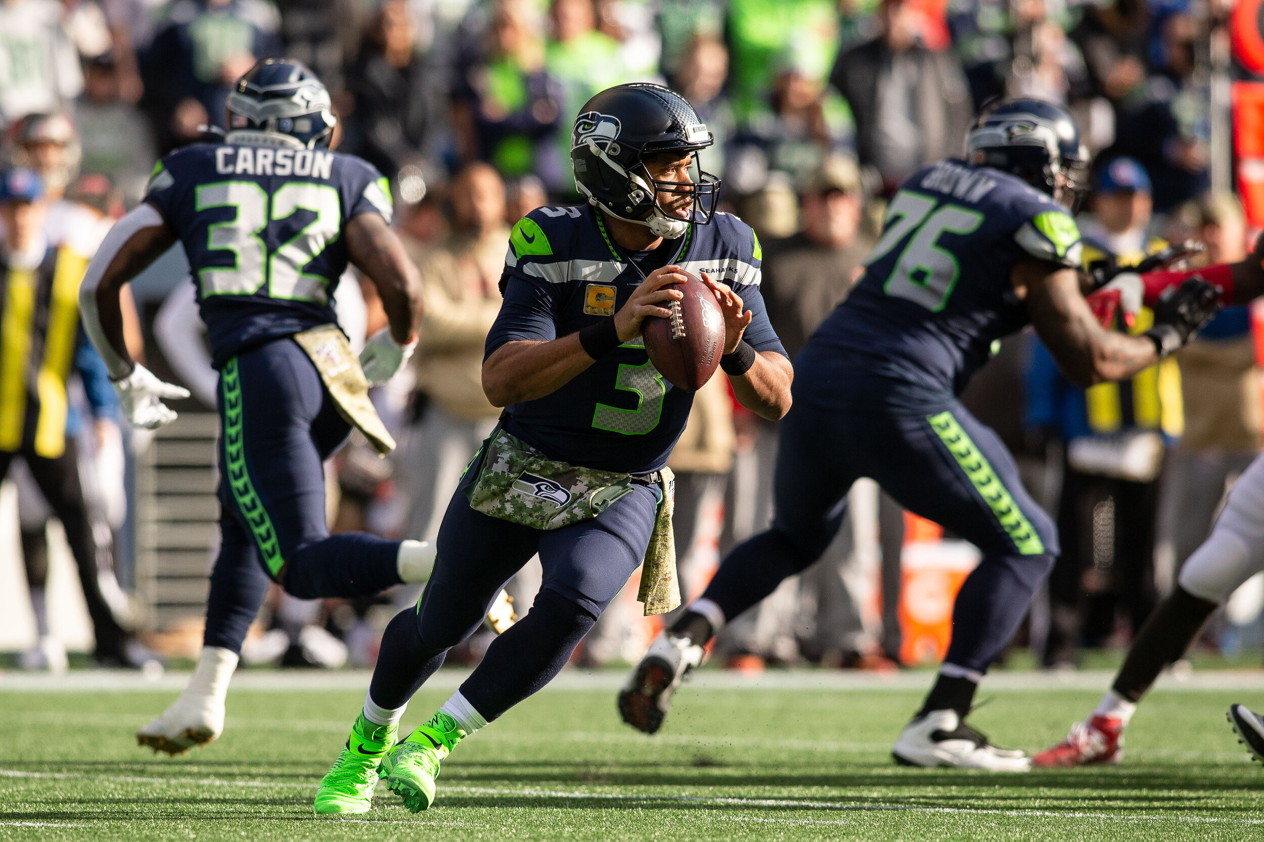  Seattle Seahawks quarterback Russell Wilson (3) throws the ball during the first quarter of an NFL football game against the Tampa Bay Buccaneers, Sunday, Nov. 3, 2019, in Seattle. Seattle defeated Tampa Bay 40-34 in overtime. (Matt Ferris/Image of 