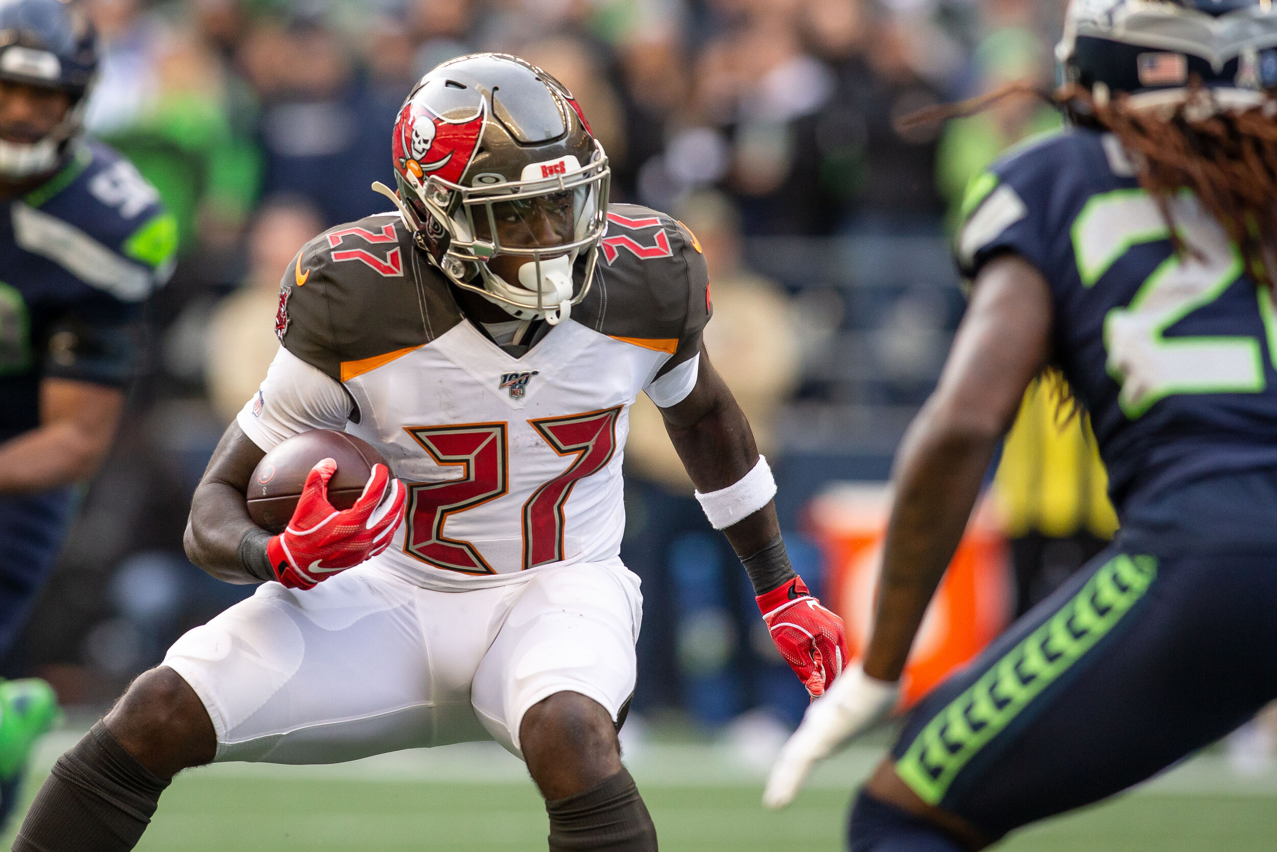  Tampa Bay Buccaneers running back Ronald Jones II (27) runs with the ball during the third quarter of an NFL football game against the Seattle Seahawks, Sunday, Nov. 3, 2019, in Seattle. Seattle defeated Tampa Bay 40-34 in overtime. (Matt Ferris/Ima