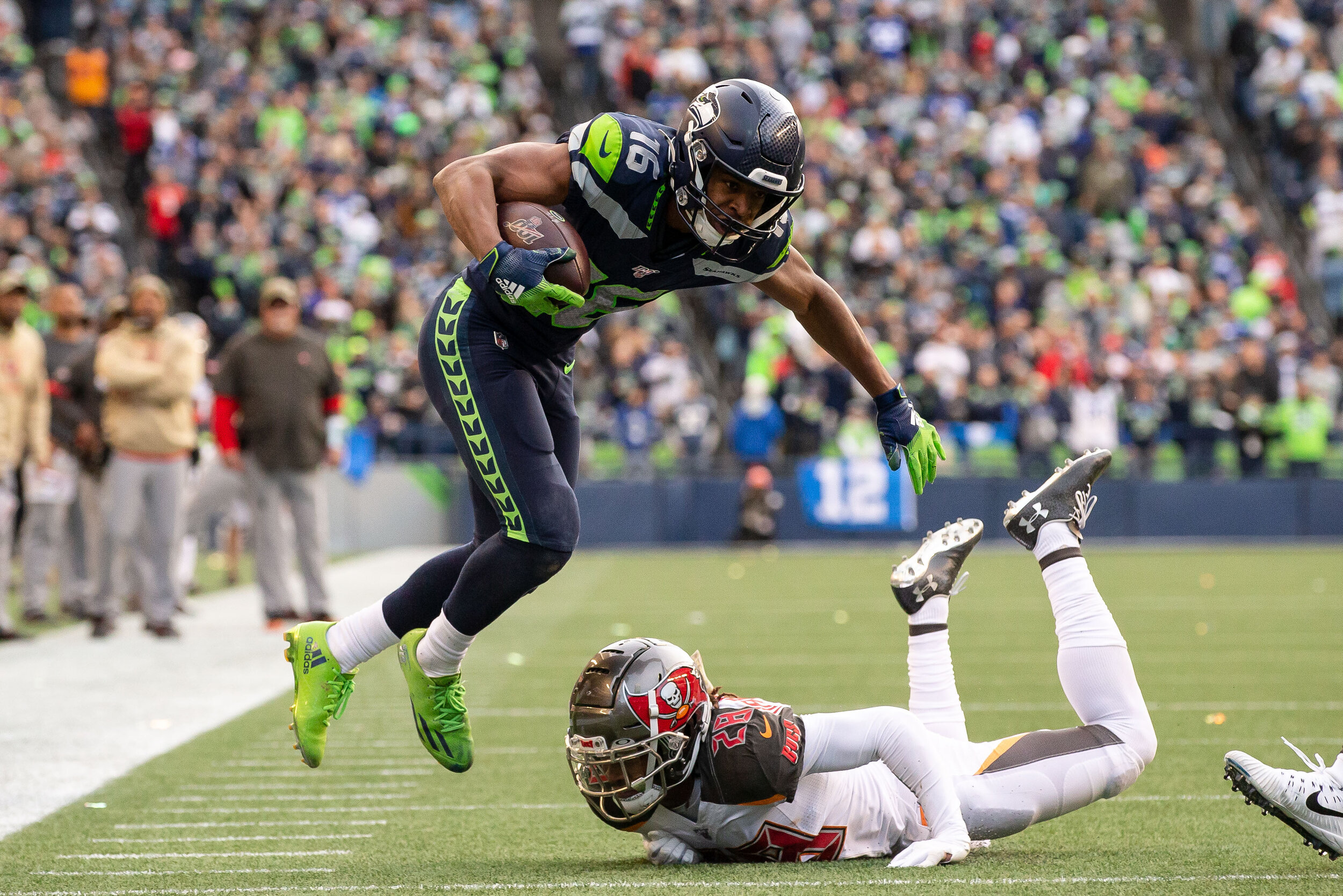  Seattle Seahawks wide receiver Tyler Lockett (16) bounces away from Tampa Bay Buccaneers cornerback Vernon Hargreaves III (28) during the fourth quarter of an NFL football game, Sunday, Nov. 3, 2019, in Seattle. Seattle defeated Tampa Bay 40-34 in o