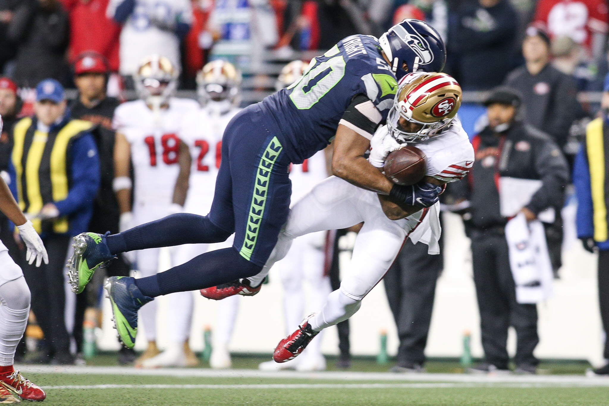  Seattle Seahawks outside linebacker K.J. Wright (50) hits San Francisco 49ers wide receiver Emmanuel Sanders (17) during the second quarter of an NFL football game, Sunday, December 29, 2019, in Seattle. The 49ers defeat the Seahawks 26-21. (Matt Fe