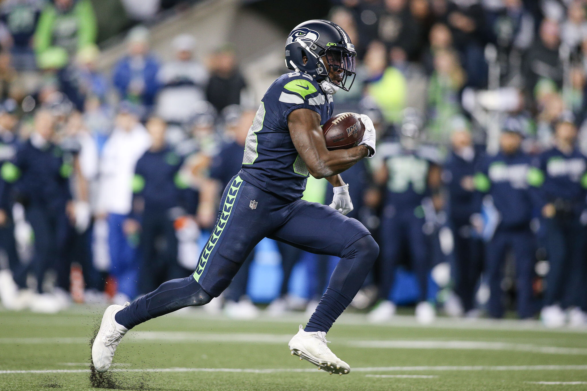  Seattle Seahawks wide receiver David Moore (83) runs with the ball during the fourth quarter of an NFL football game against the San Francisco 49ers, Sunday, December 29, 2019, in Seattle. The 49ers defeat the Seahawks 26-21. (Matt Ferris/Image of S