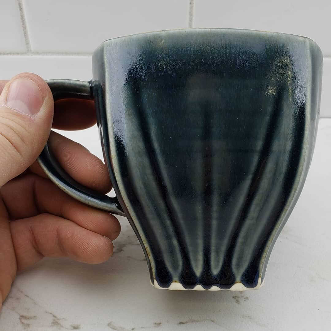 Fresh out the kiln. I may have snuck this one out with a glove at 300⁰F. Shhh, don't tell anyone. Digging this dark/blue/grey glaze. What do you thinks?

#slipcasting #ceramics #3dprinting #pottery #glazetest #potteryofinstagram #tableware #coffeecup