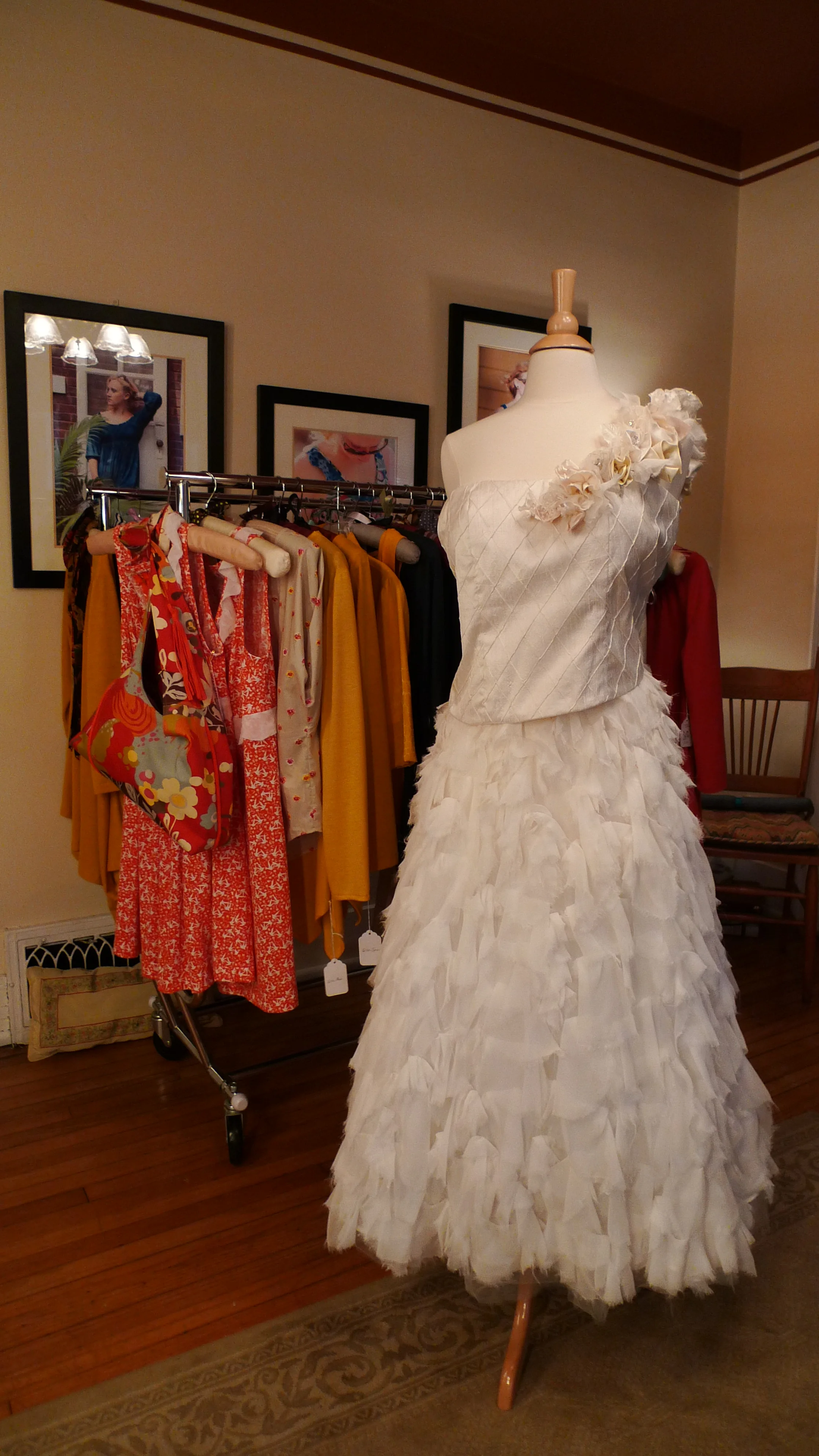 One-of-a-kind wedding dress . . . flower-trimmed pin-tucked silk top and feathered silk skirt . . . 
