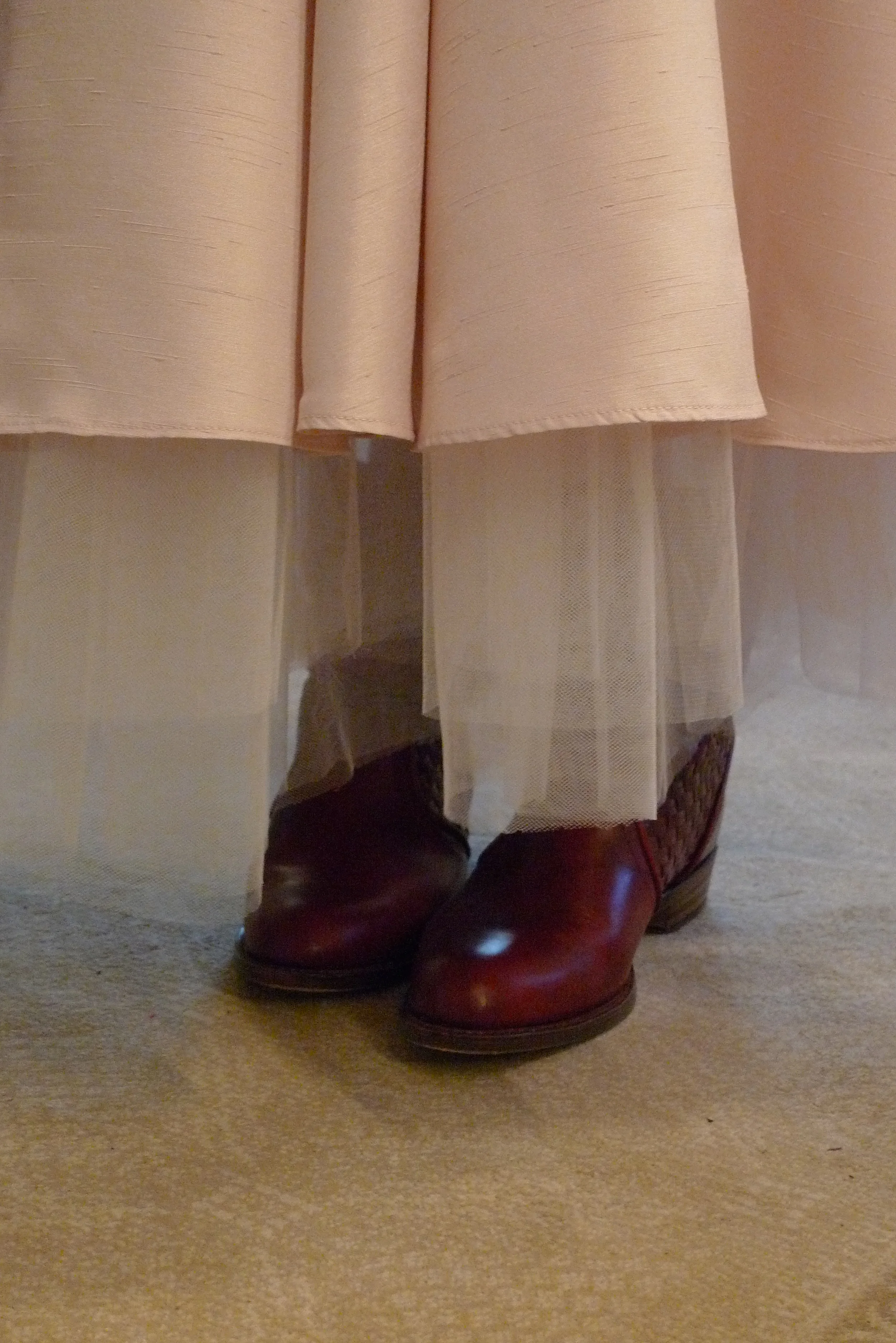  Our custom-made garments are co-designed with the client's ideas--and often her footwear--being of utmost importance. 