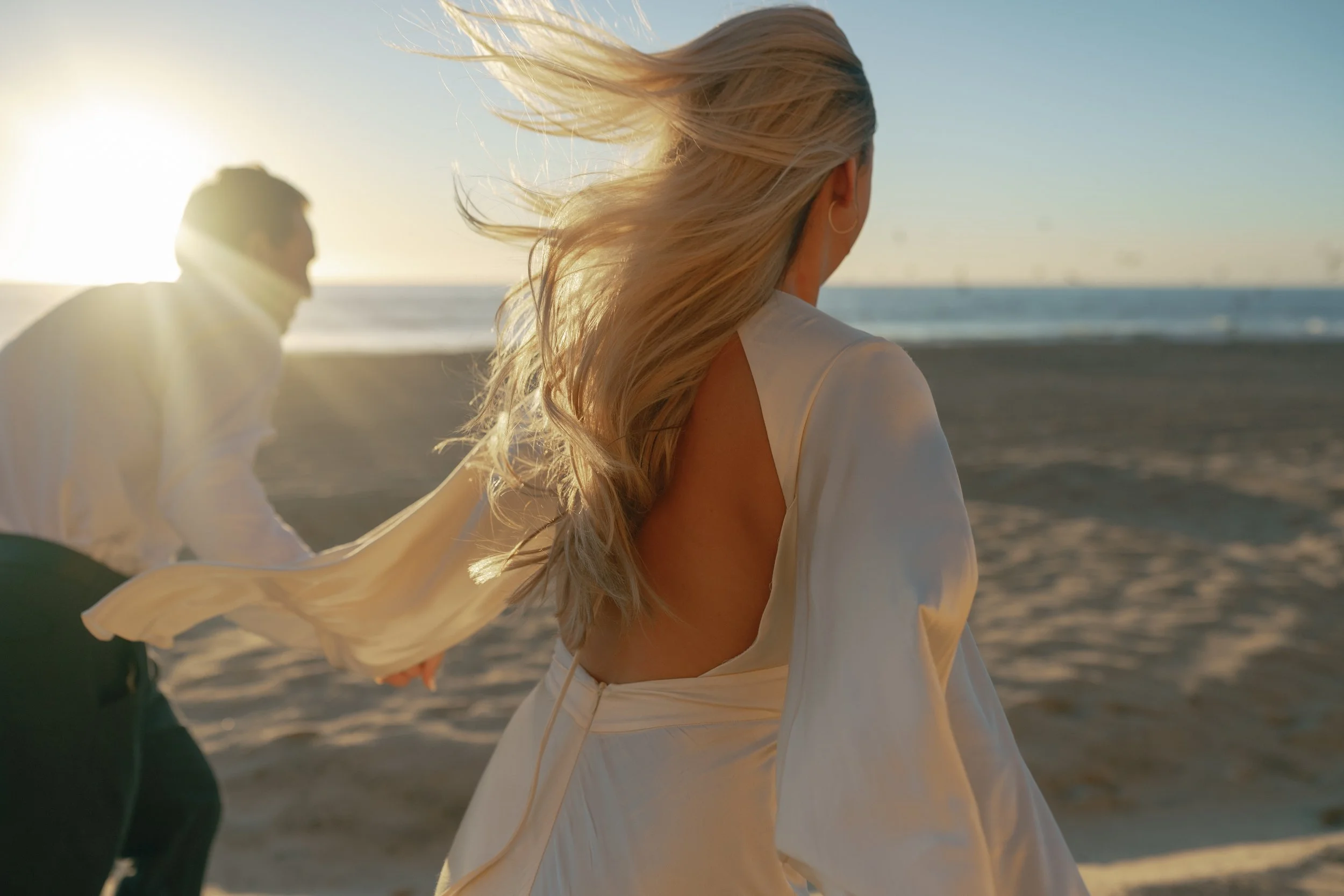 San Diego wedding photographer shoots romantic beach engagement photos at Fletcher's Cove