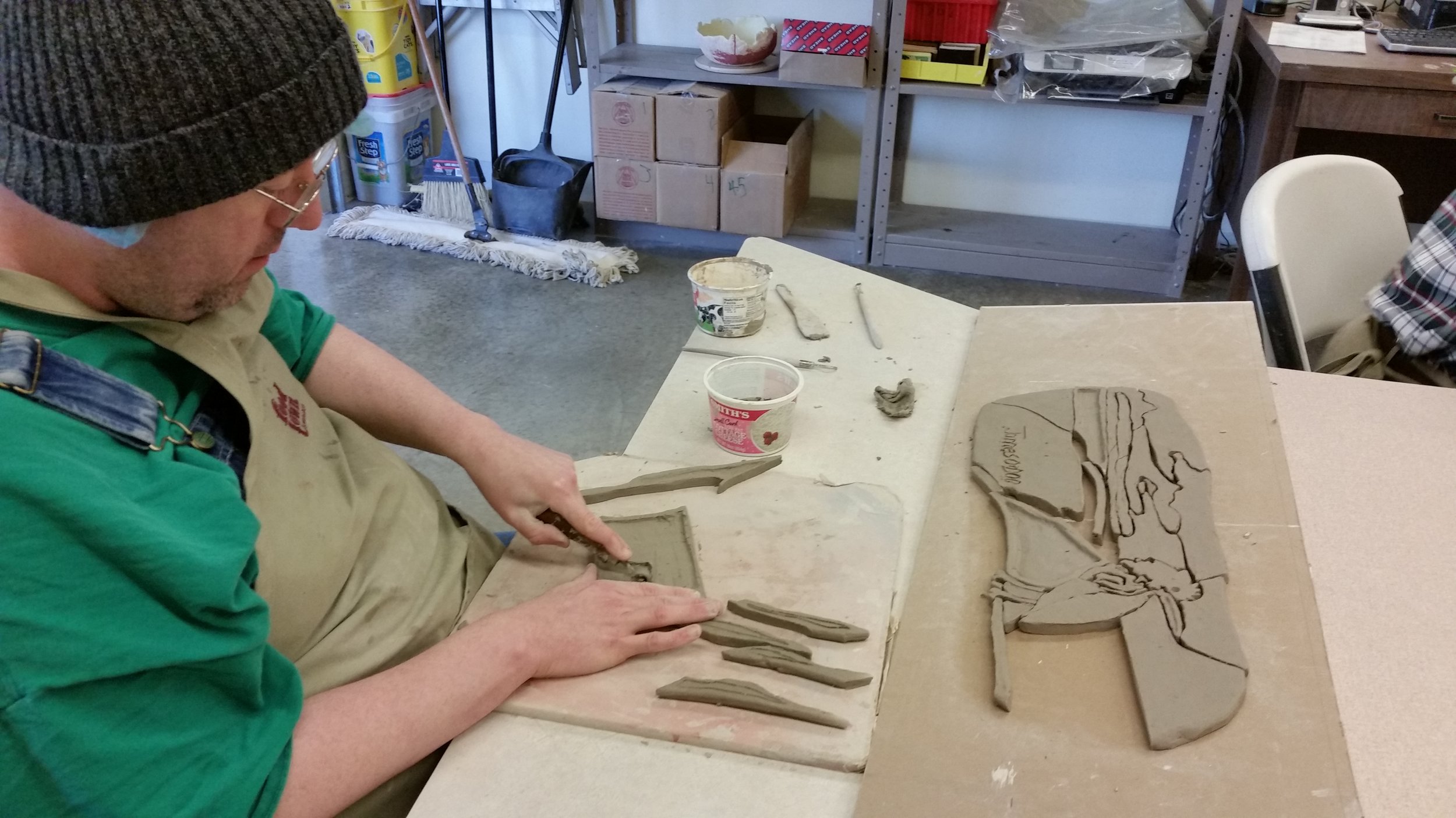 Here is James cutting and carving the pieces which became his "Shoreline" mosaic.