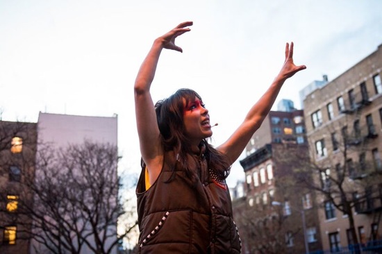 Emily Johnson speaking to spectators gathered at P.S. 11 before the performance of her SH ORE at New York Live Arts. Photo: Ian Douglas
