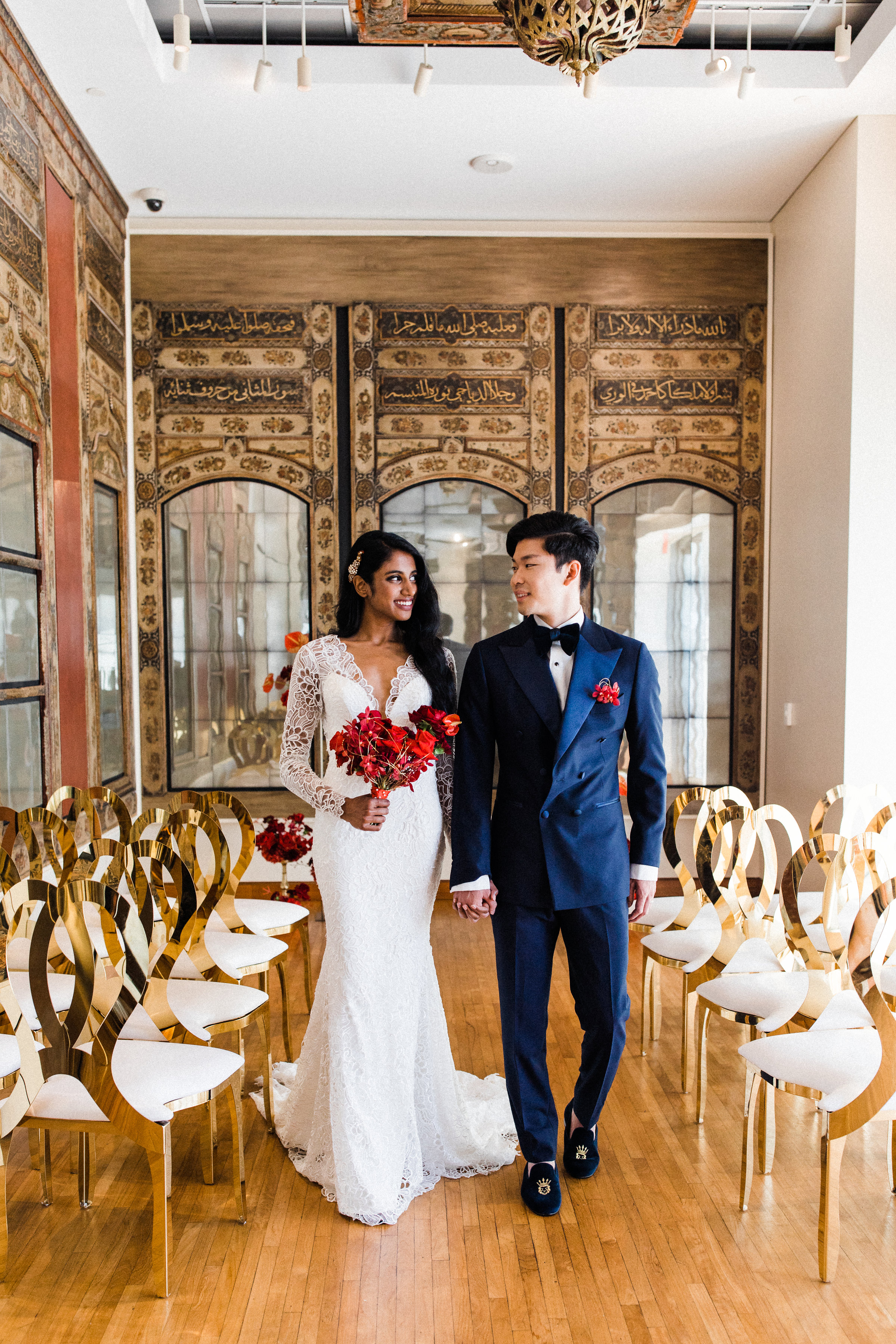 August In Bloom - Bride and groom at ceremony - Scarlet Sweetheart (Lavish Dulhan)