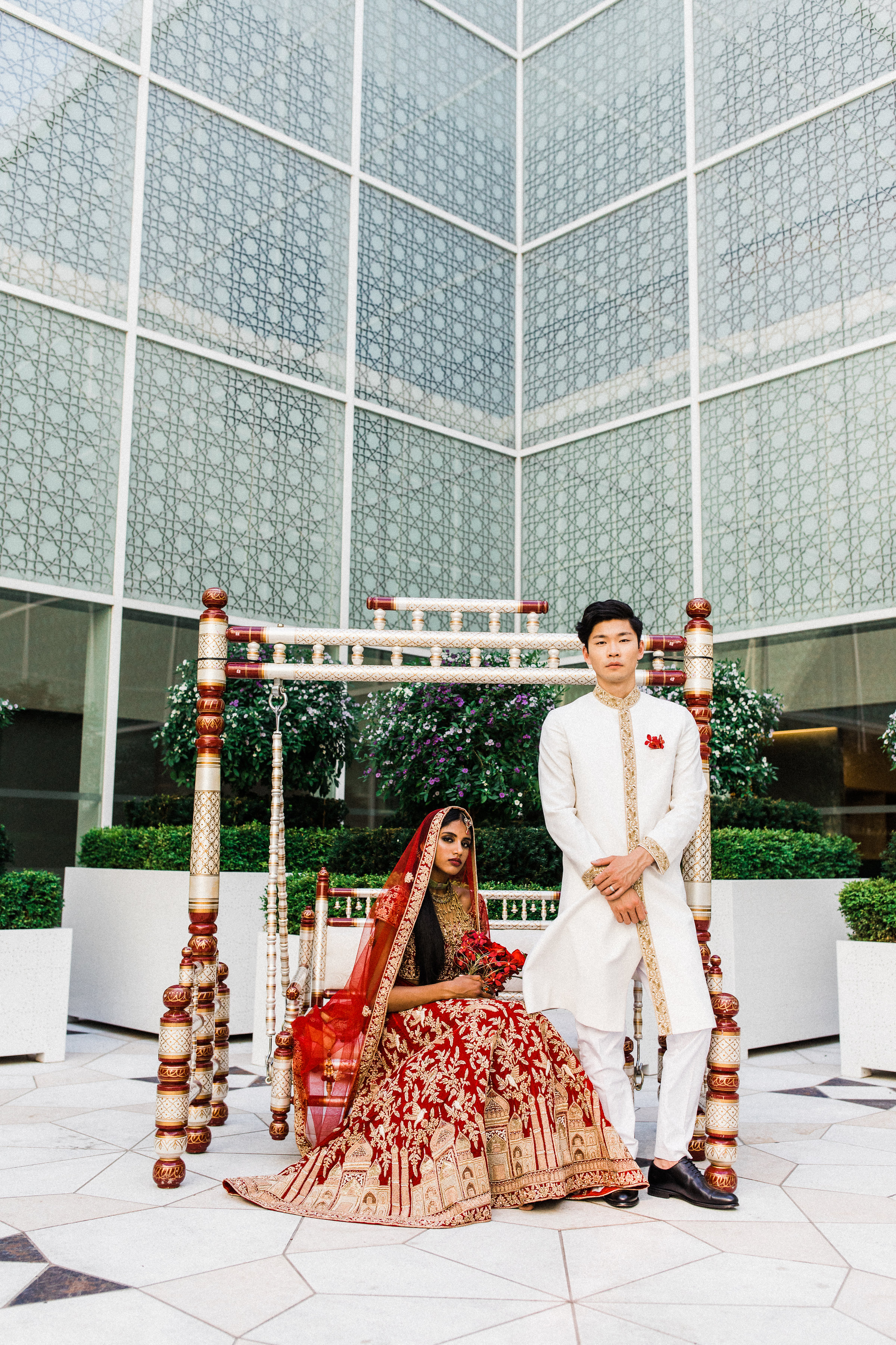 August In Bloom - Bride and groom at ceremony - Scarlet Sweetheart (Lavish Dulhan)