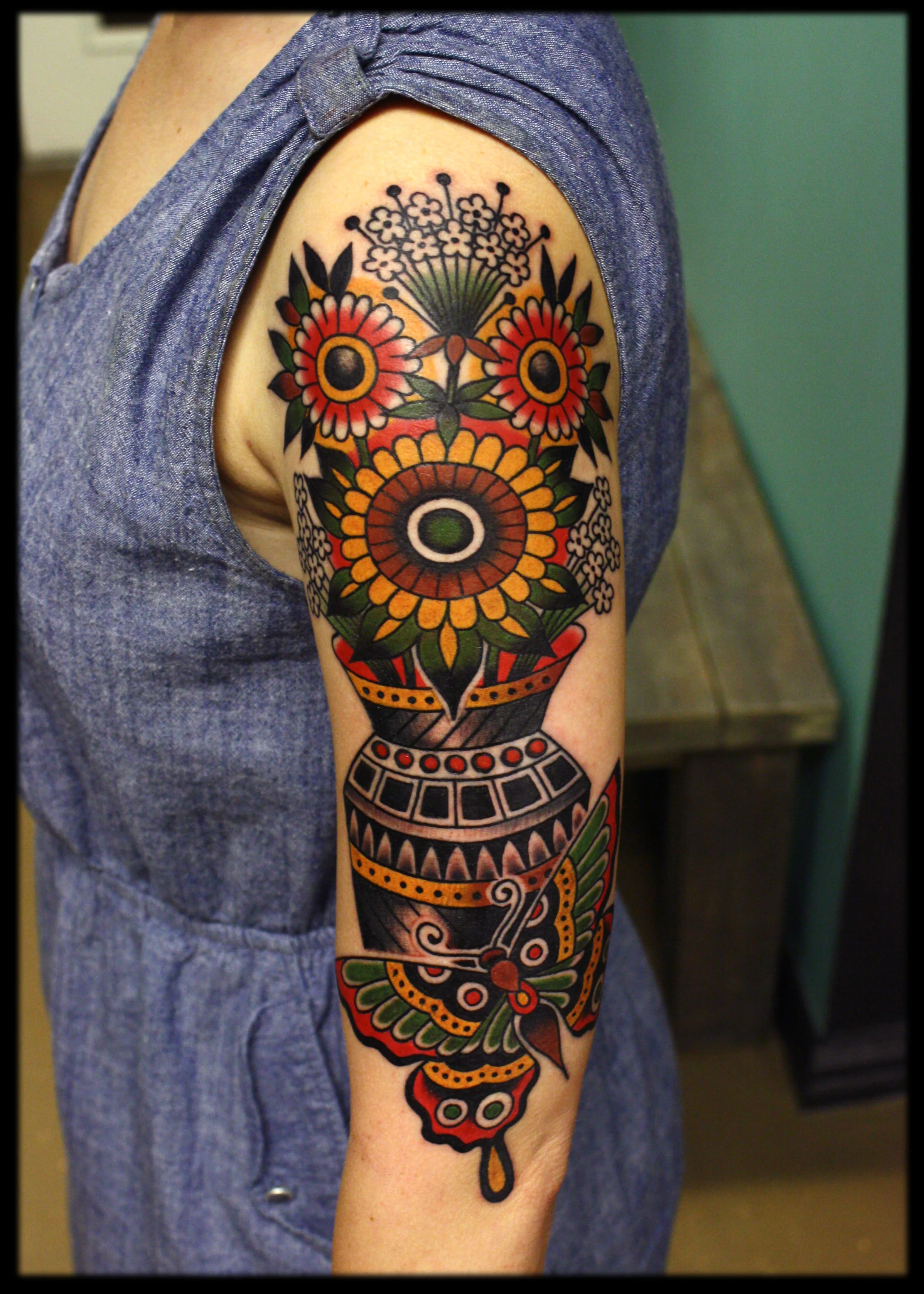 Traditional Flower and butterfly tattoo