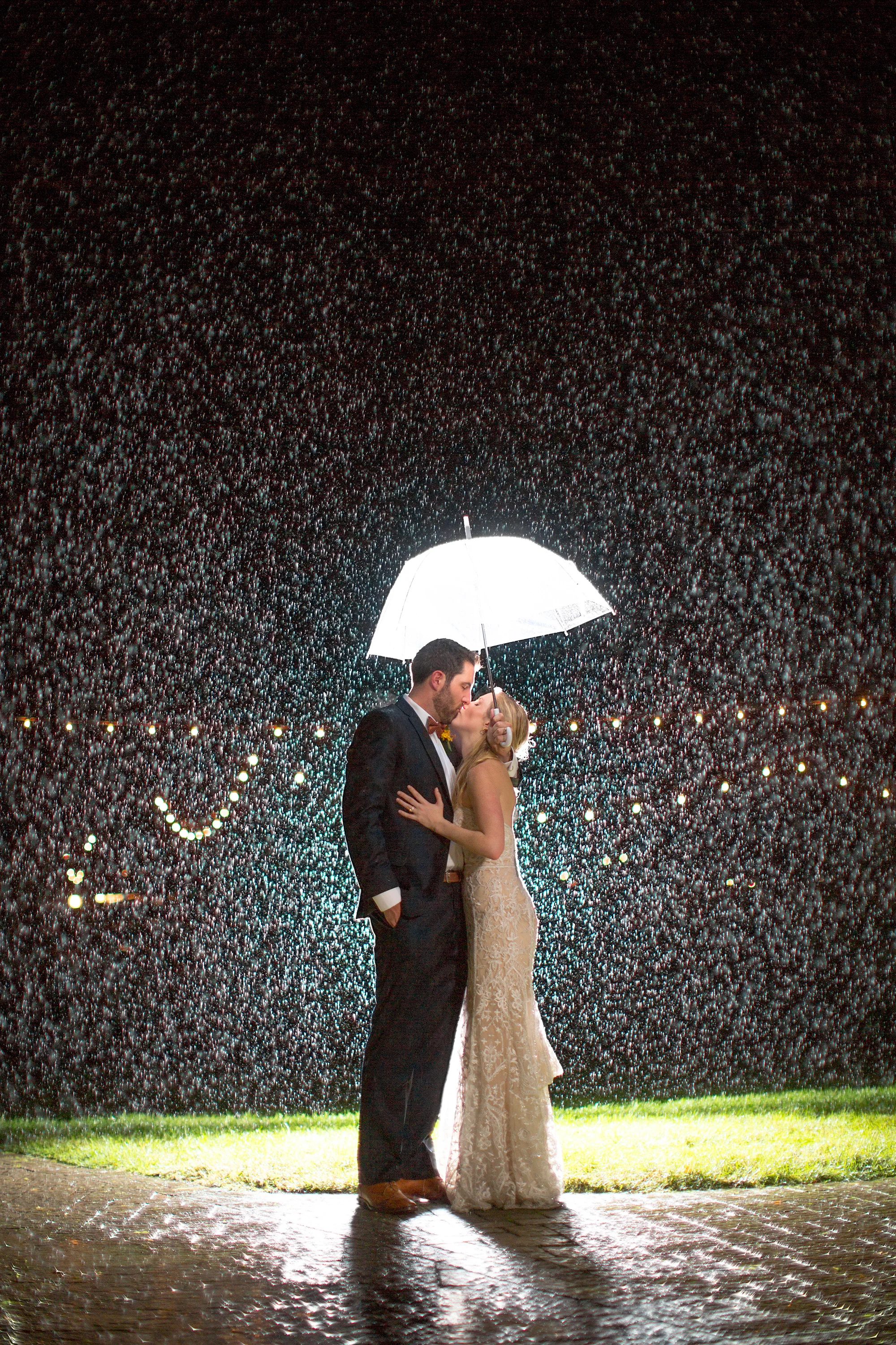 I love this photo. And it's gone a bit "viral" sure. But what excites me about this photo is the couple. I remember talking to them during our consultation about chipotle and the redskins. I look at this image and think about how willing they were to let me try something different and how awesome they were about the torrential downpour on their wedding day. 