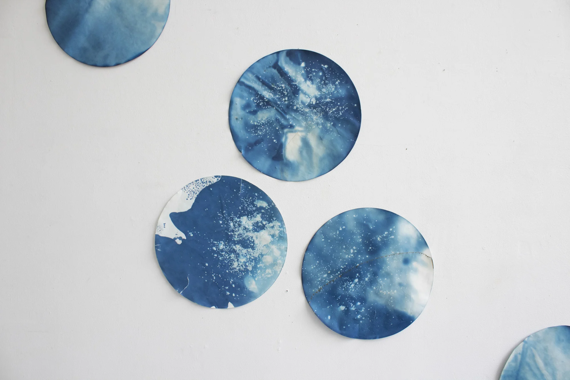 Hannah Perrine Mode. Europa (pouring in from Taurus) , 2018. Ice (Oakland tap water, Antarctic ice core samples, Juneau Icefield glacier water) and cyanotype on filter paper. Detail.
