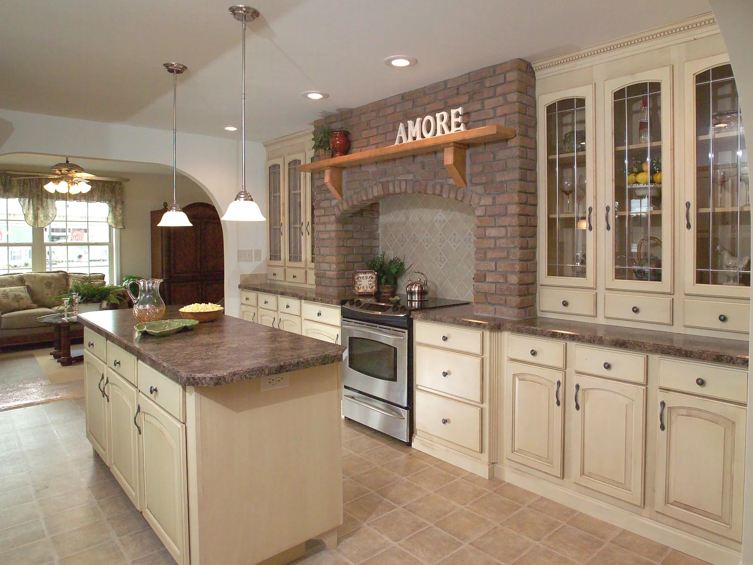 HAND-LAID BRICK APPLIED TO A GALLEY STYLE HEARTH KITCHEN, WITH A SOLID WOOD HONEY MAPLE MANTLE