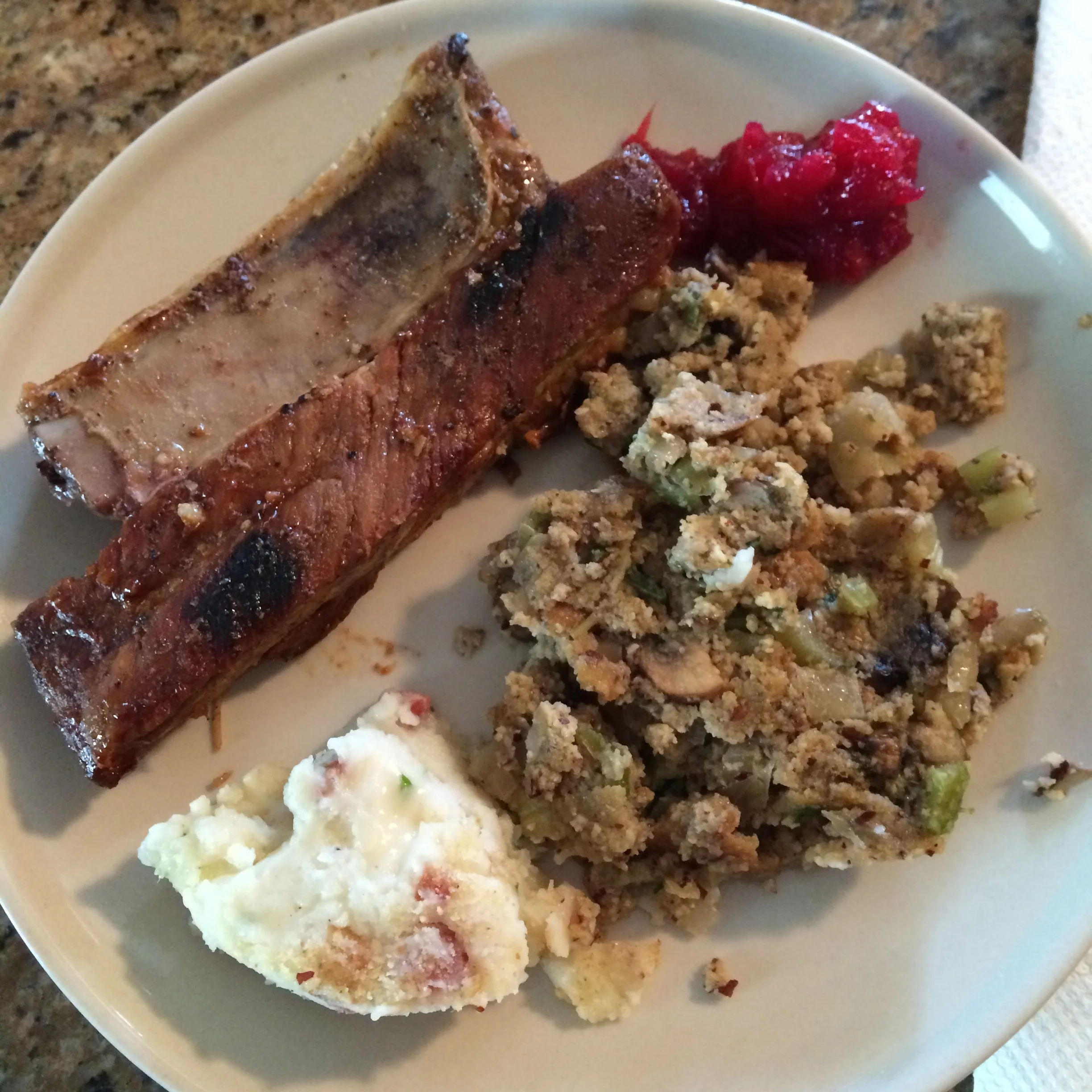 LEFTOVERS: my dad's ribs (the best), paleo "cornbread" stuffing which I made myself (the bread included), and my aunt's 3 cheese pancetta mashed potatoes (ridiculously good) and homemade cranberry sauce!